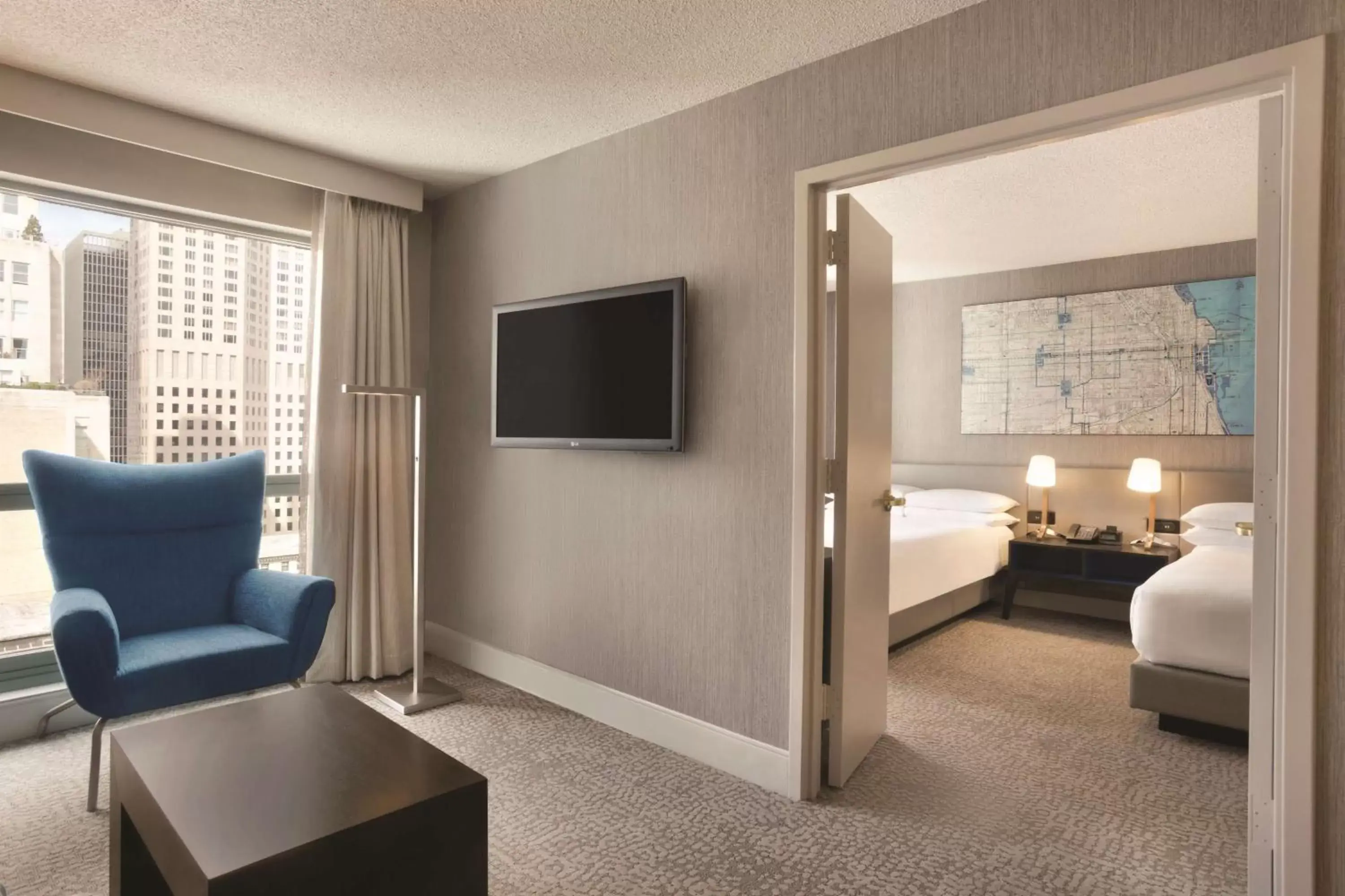 Bedroom, TV/Entertainment Center in Hilton Chicago Magnificent Mile Suites