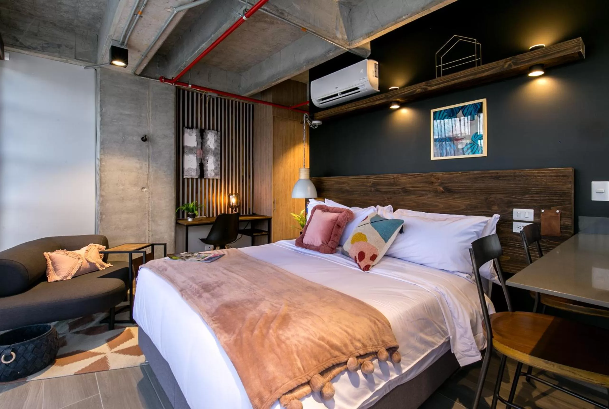 Bed in Factory Lofts Hotel