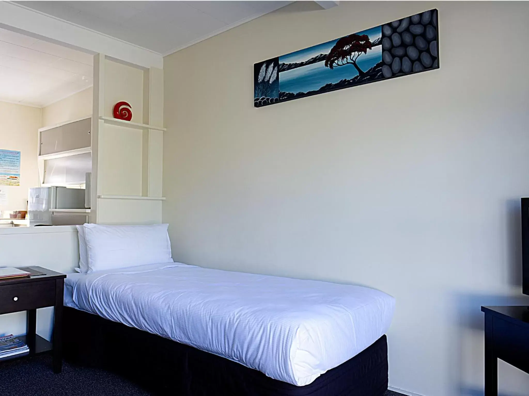 Bed in Tairua Shores Motel