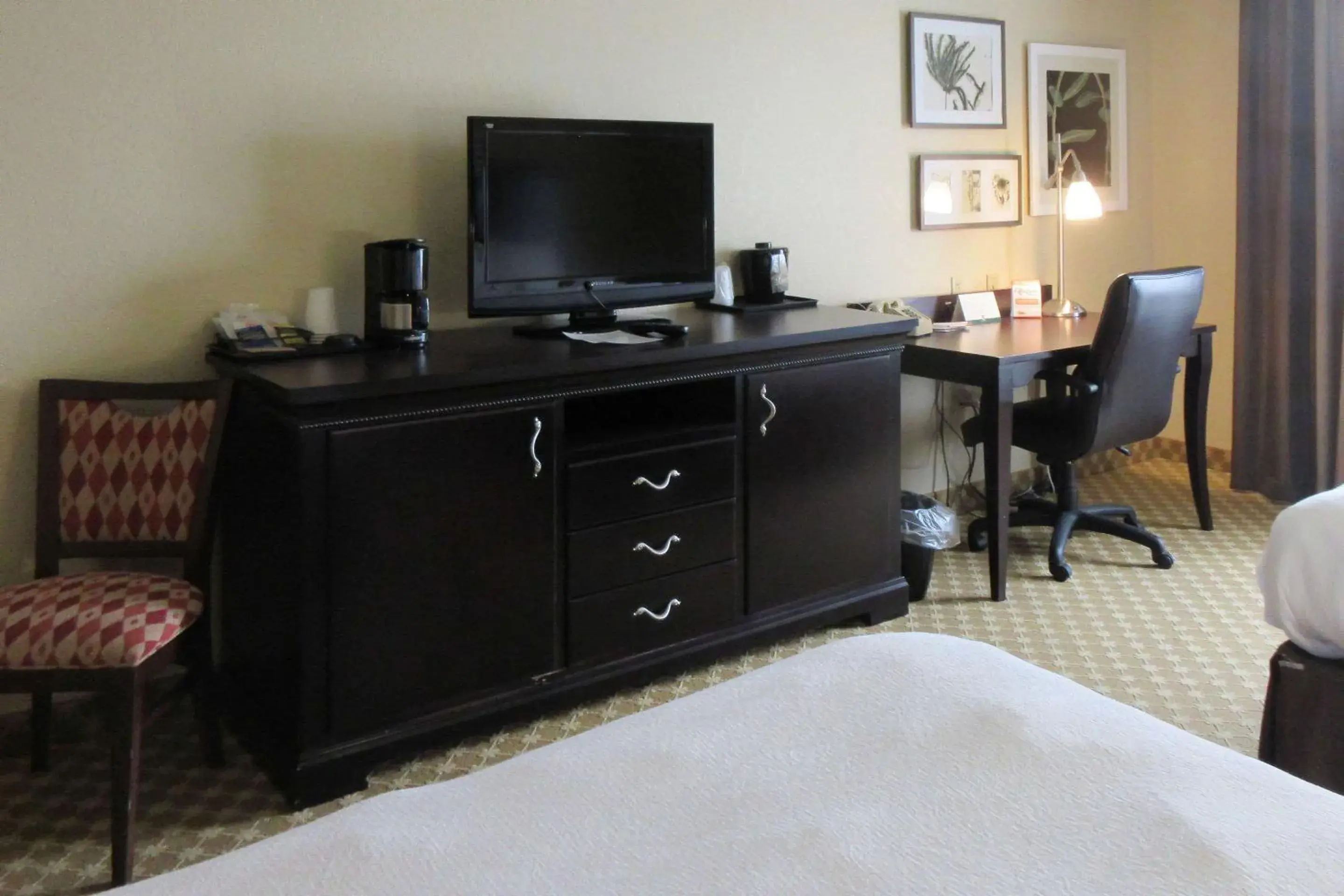 Photo of the whole room, TV/Entertainment Center in Quality Inn & Suites