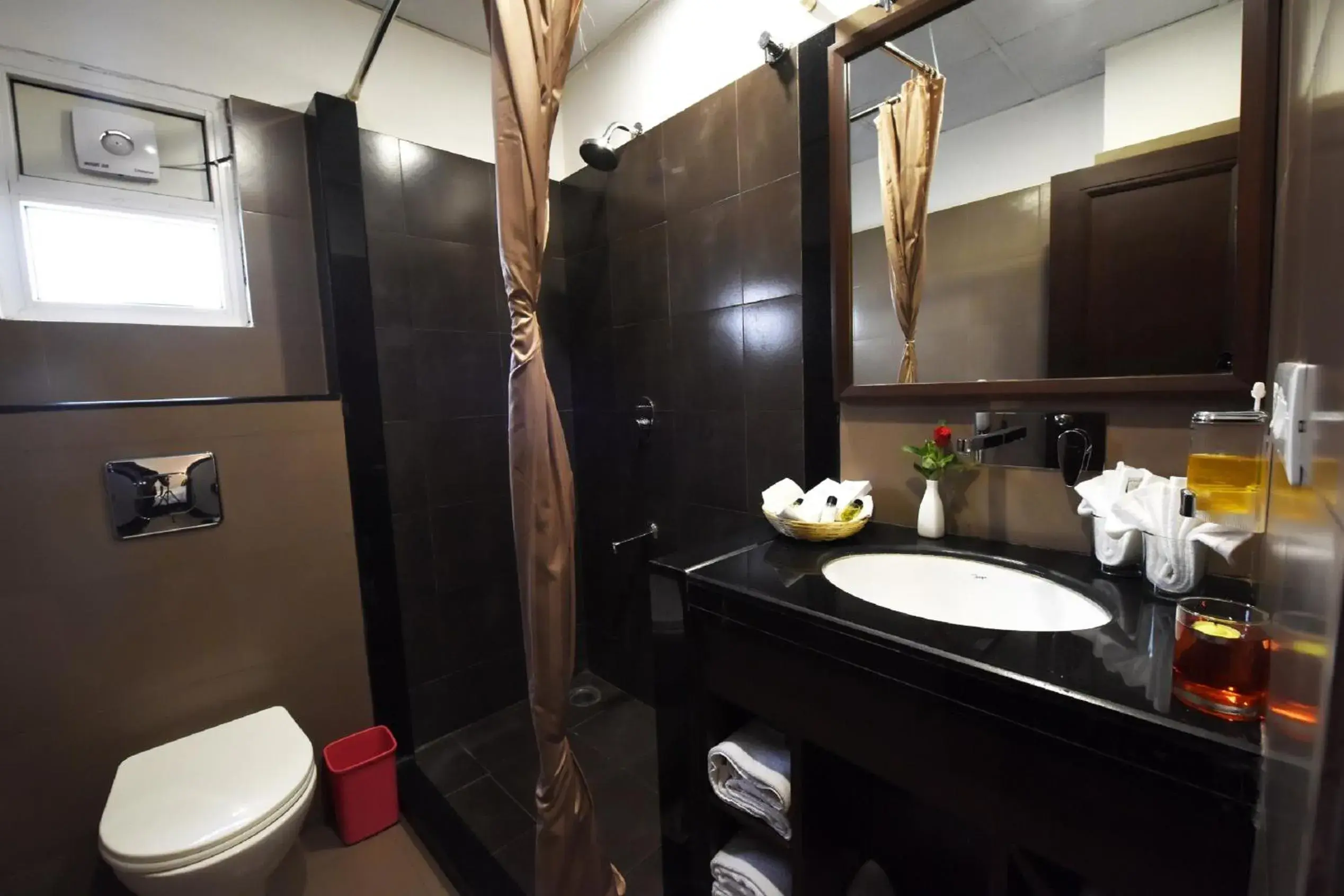 Bathroom in Hotel Gandharva - A Green Hotel