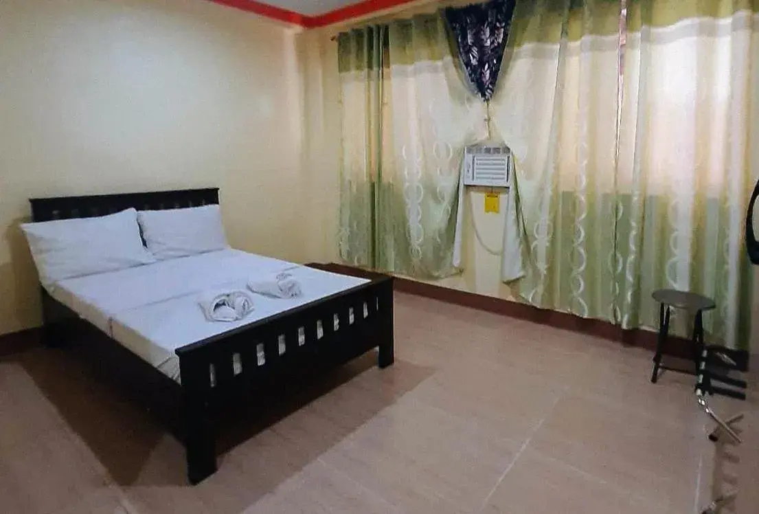 Bedroom, Bed in RedDoorz @ Johsons Pension House Butuan City