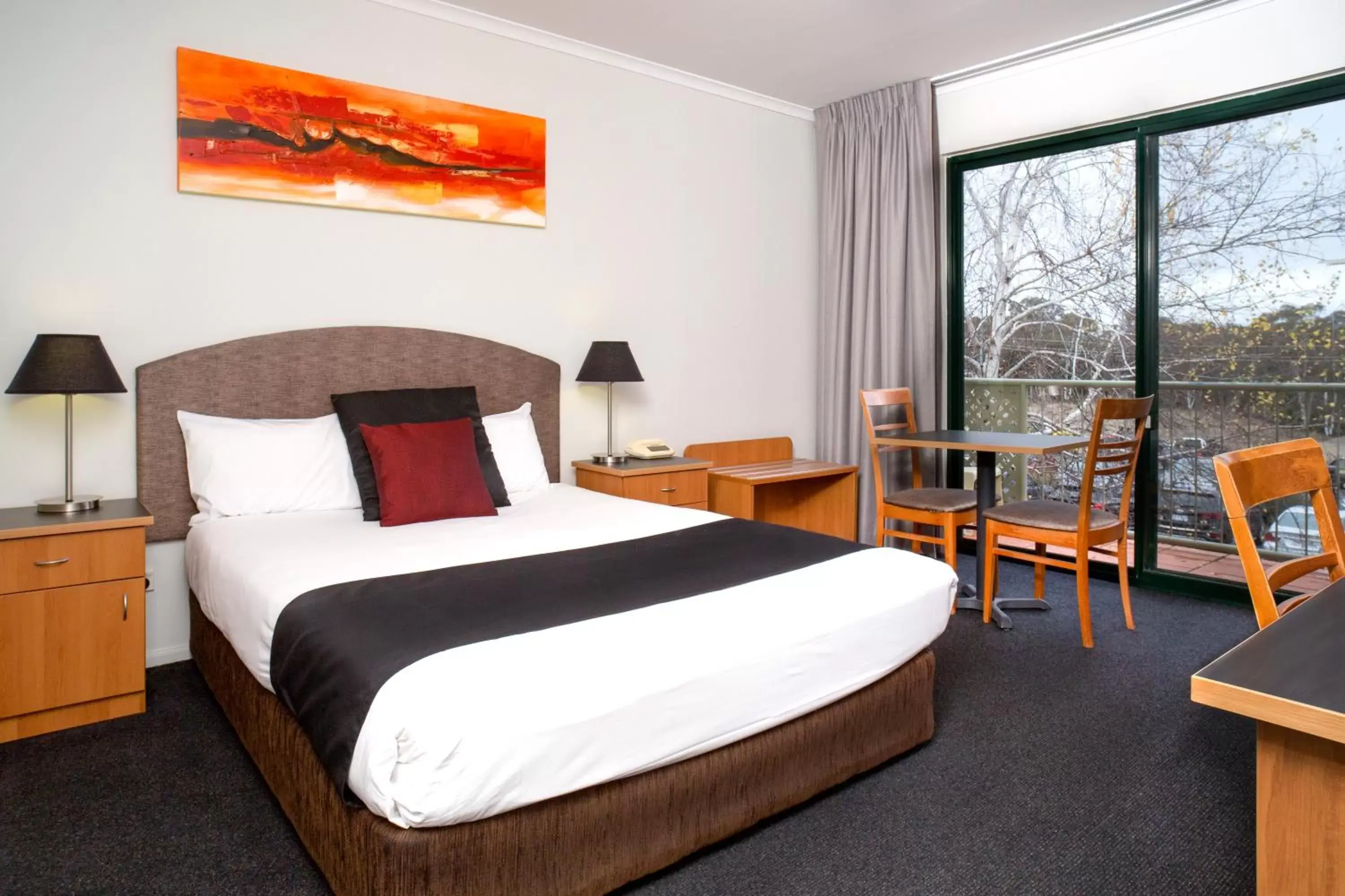 Bed in Alpha Hotel Canberra