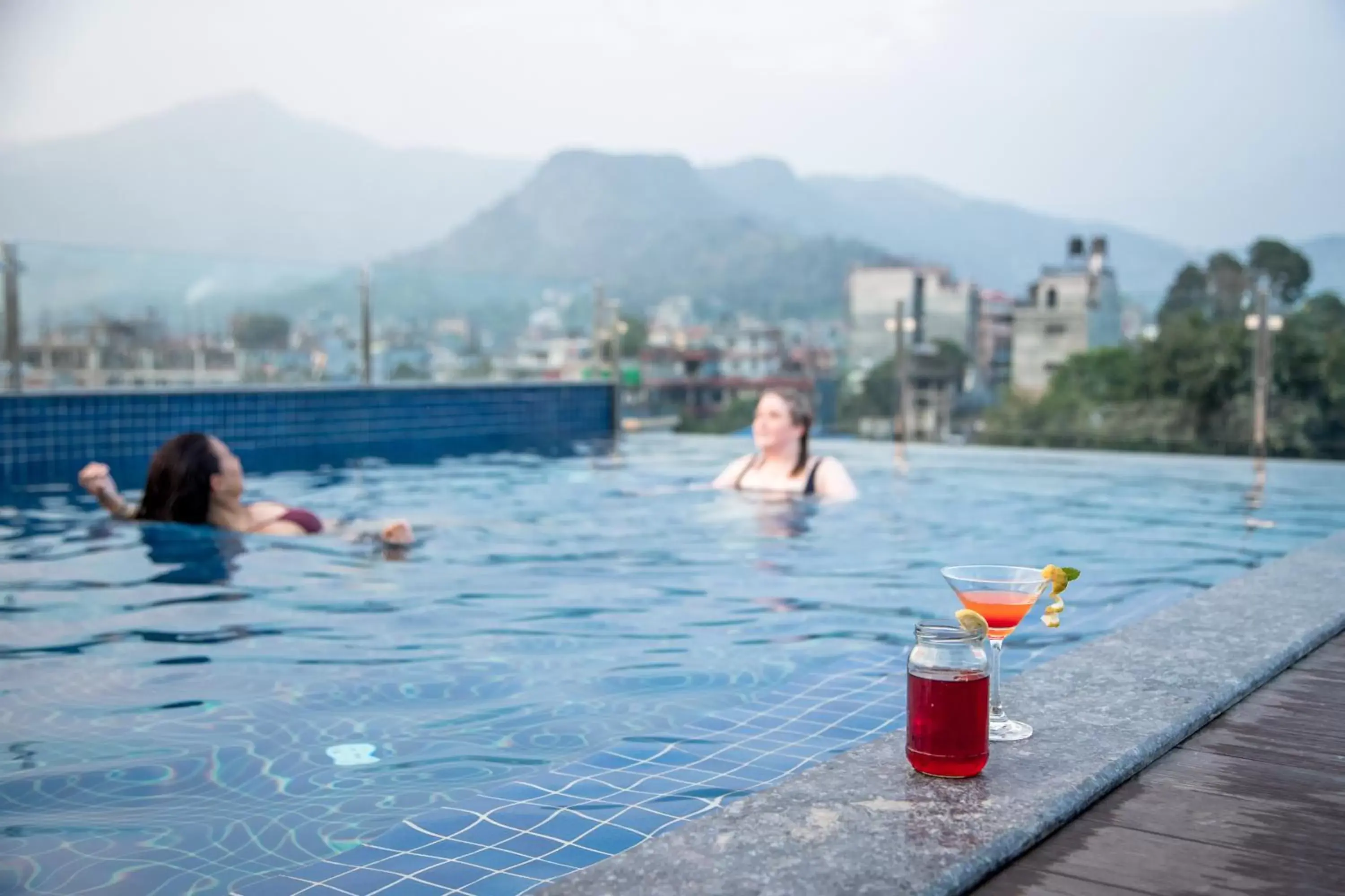 People, Swimming Pool in Dahlia Boutique Hotel