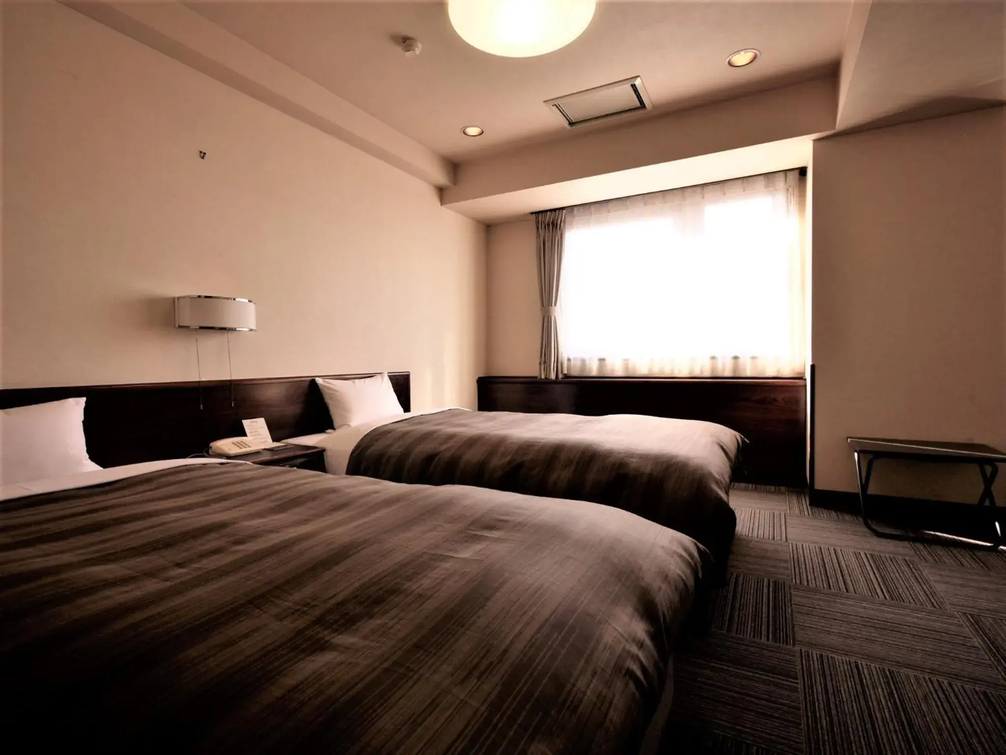 Photo of the whole room, Bed in Hotel Route Inn Nagano2