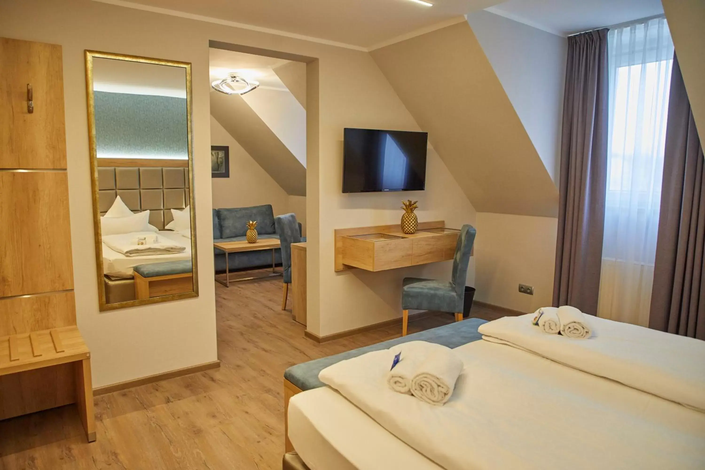 Living room, Bed in Bernstein Acamed Resort