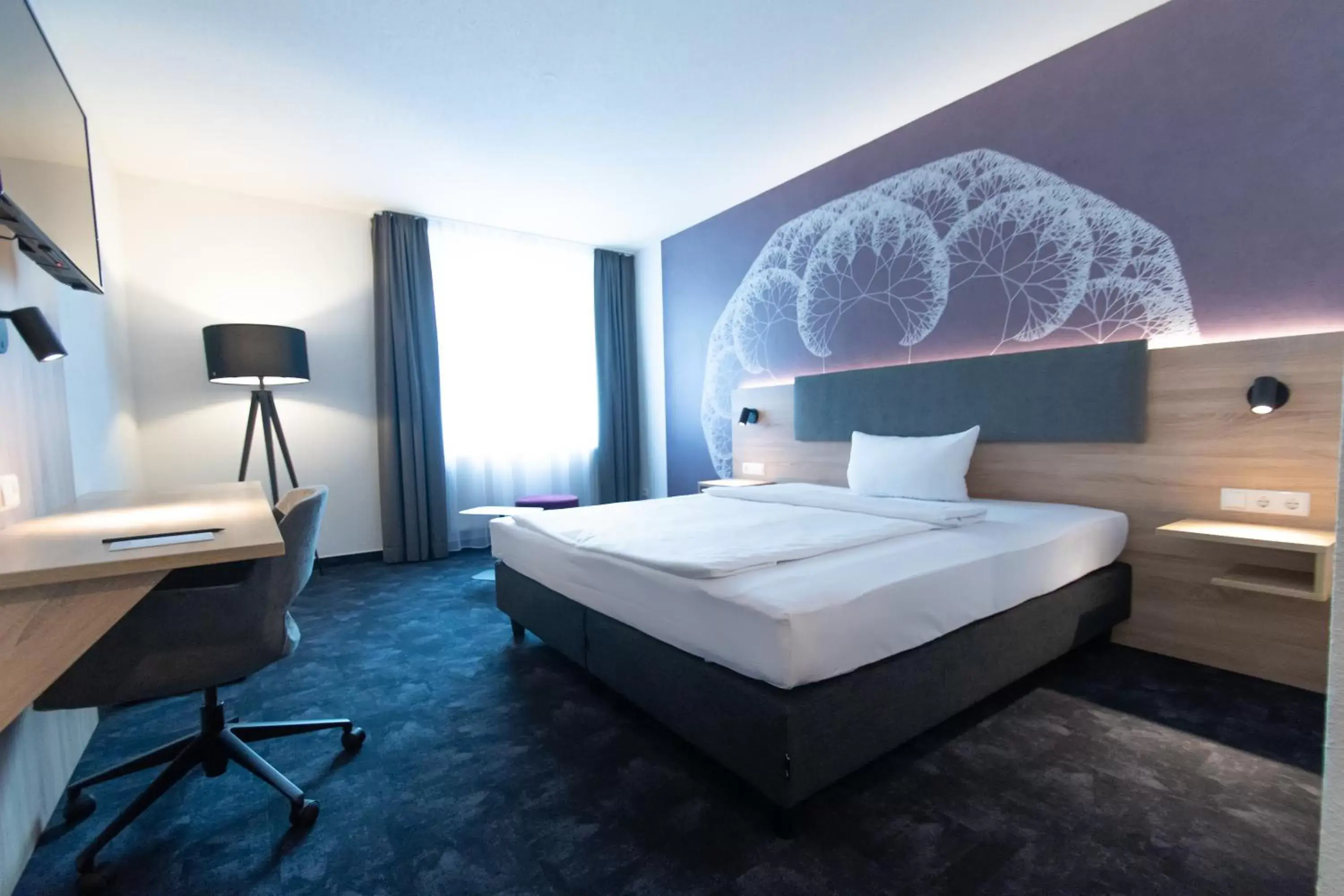 Photo of the whole room, Bed in Taste Hotel Jettingen