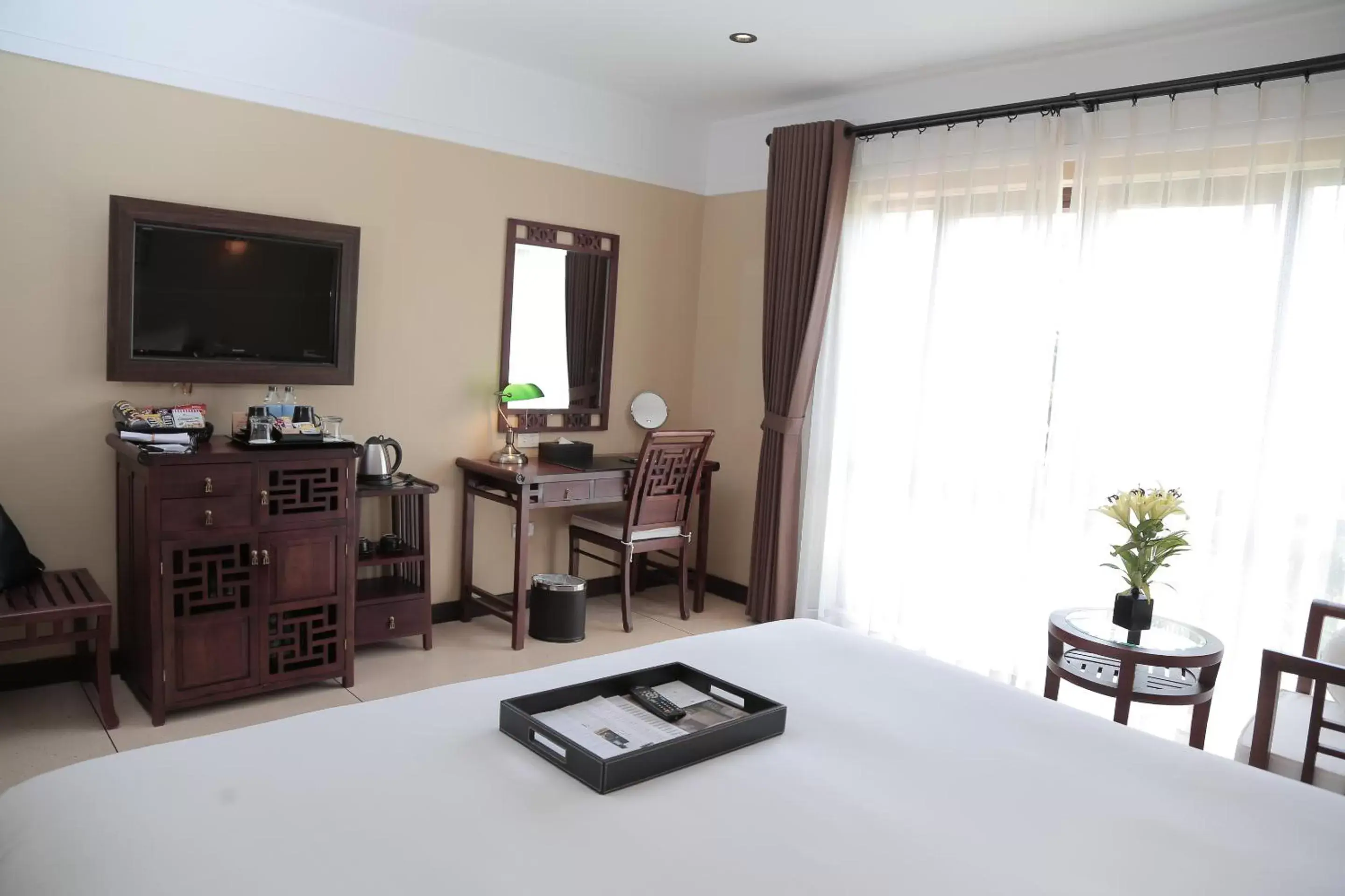Photo of the whole room, TV/Entertainment Center in La Siesta Hoi An Resort & Spa