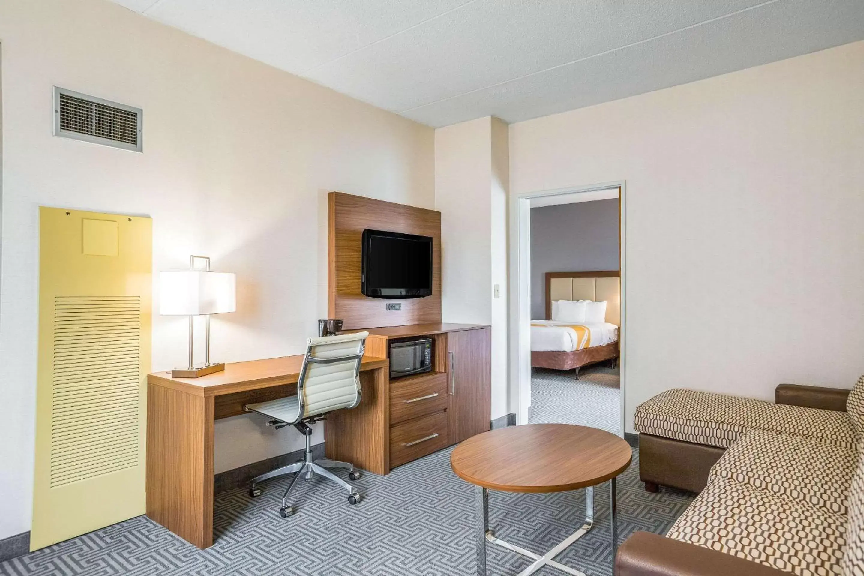 Photo of the whole room, TV/Entertainment Center in Quality Suites Hotel - Lansing