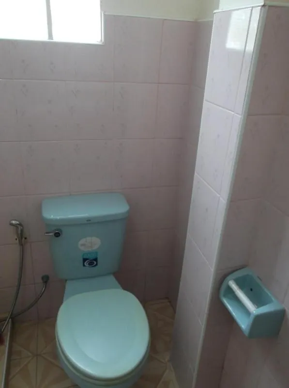 Toilet in Palm Point Village