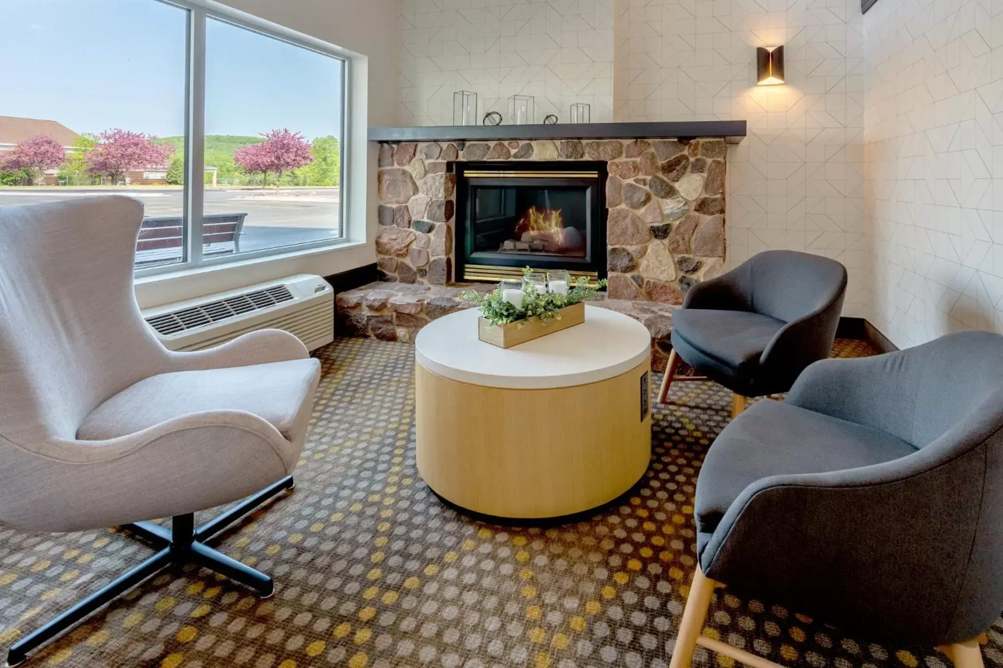 Property building, Seating Area in Holiday Inn Hotel & Suites Wausau-Rothschild, an IHG Hotel