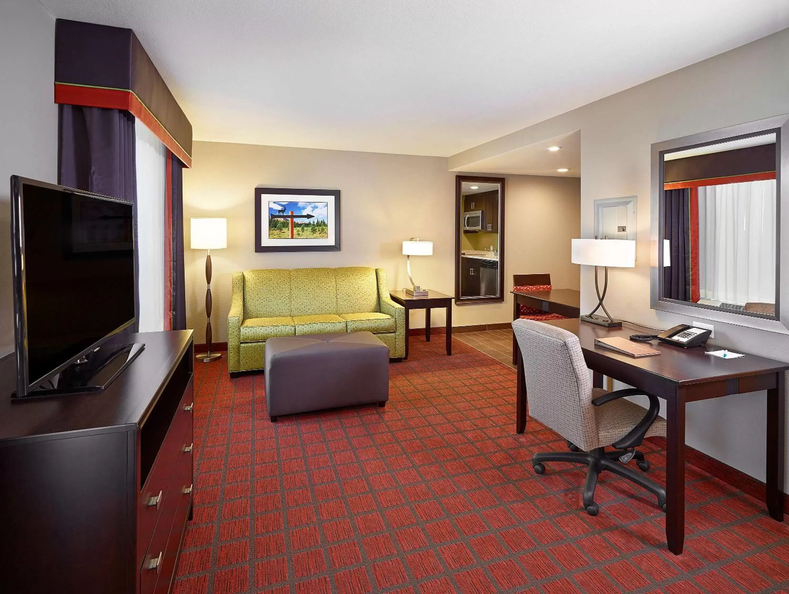 Living room, Seating Area in Homewood Suites Calgary Airport