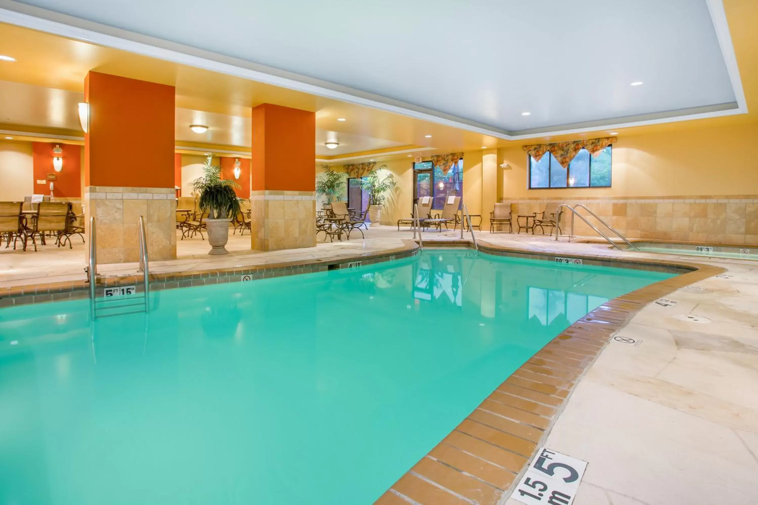 Swimming Pool in Holiday Inn Express & Suites Bloomington, an IHG Hotel