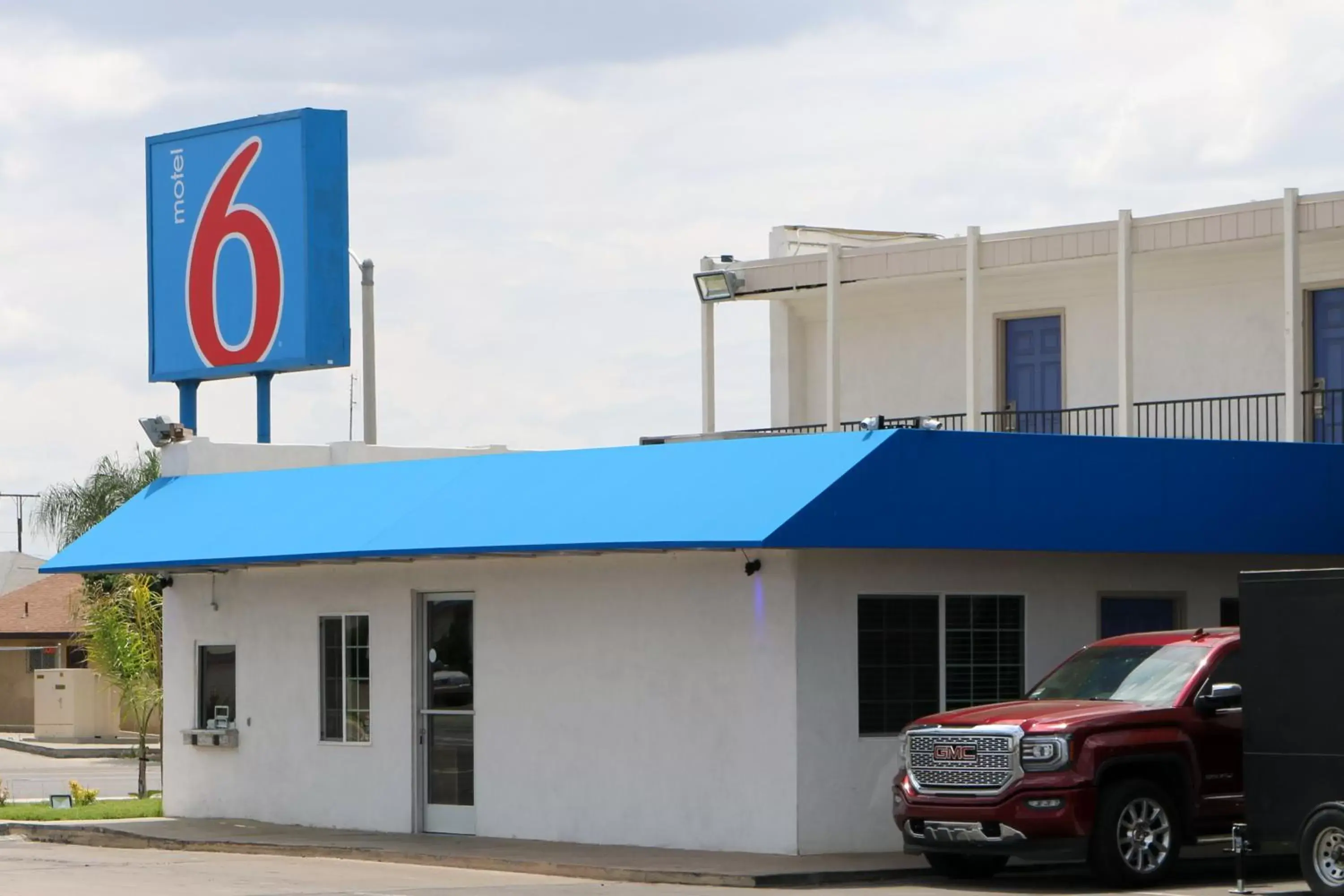 Facade/entrance, Property Building in Motel 6-Delano, CA