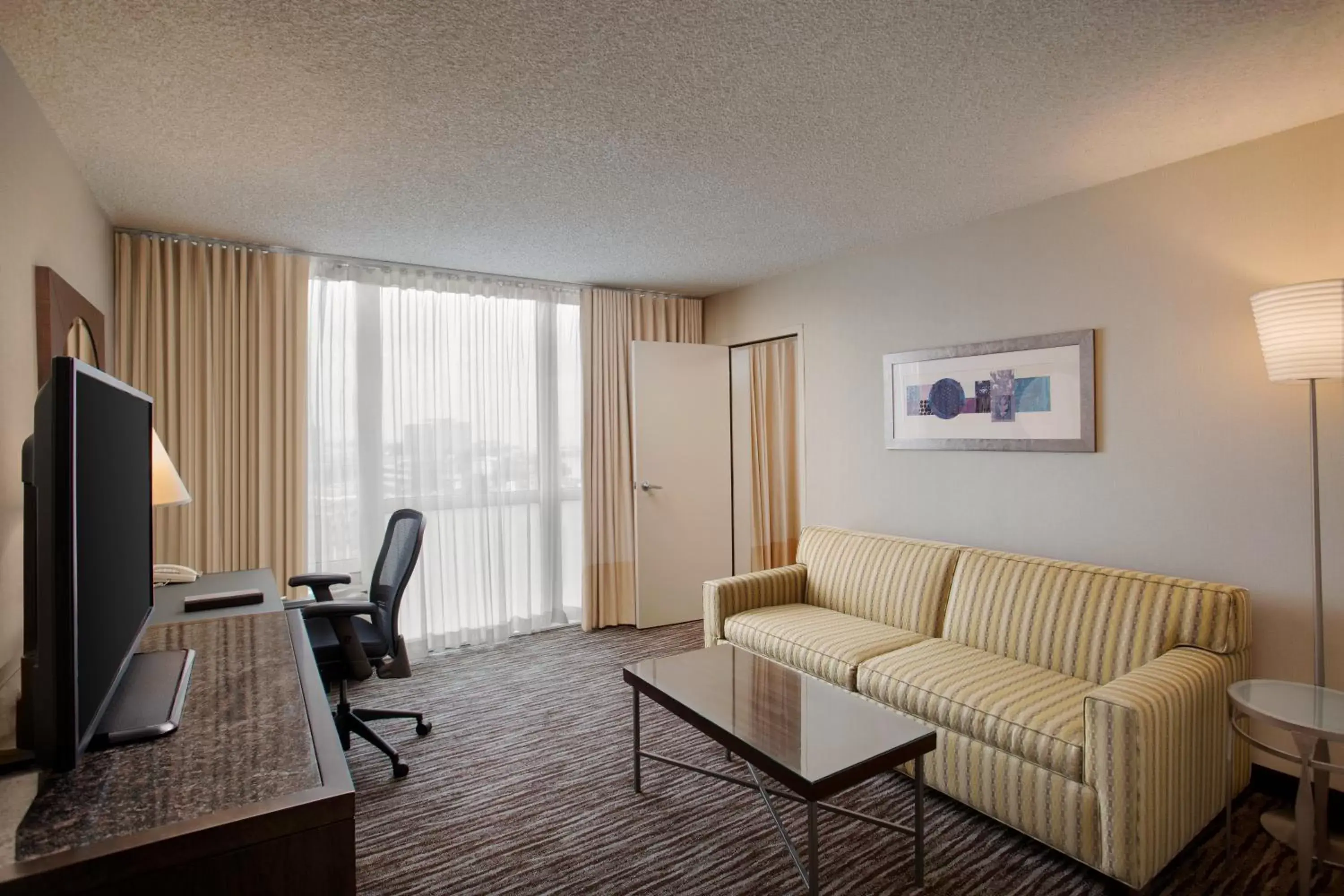 Photo of the whole room, Seating Area in Crowne Plaza San Francisco Airport, an IHG Hotel