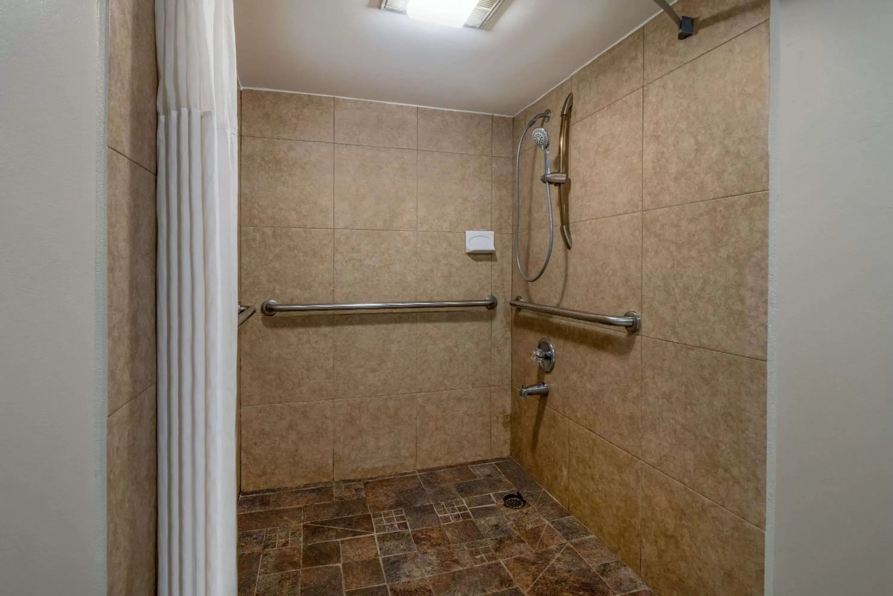 Shower, Bathroom in Days Inn by Wyndham Raleigh Midtown