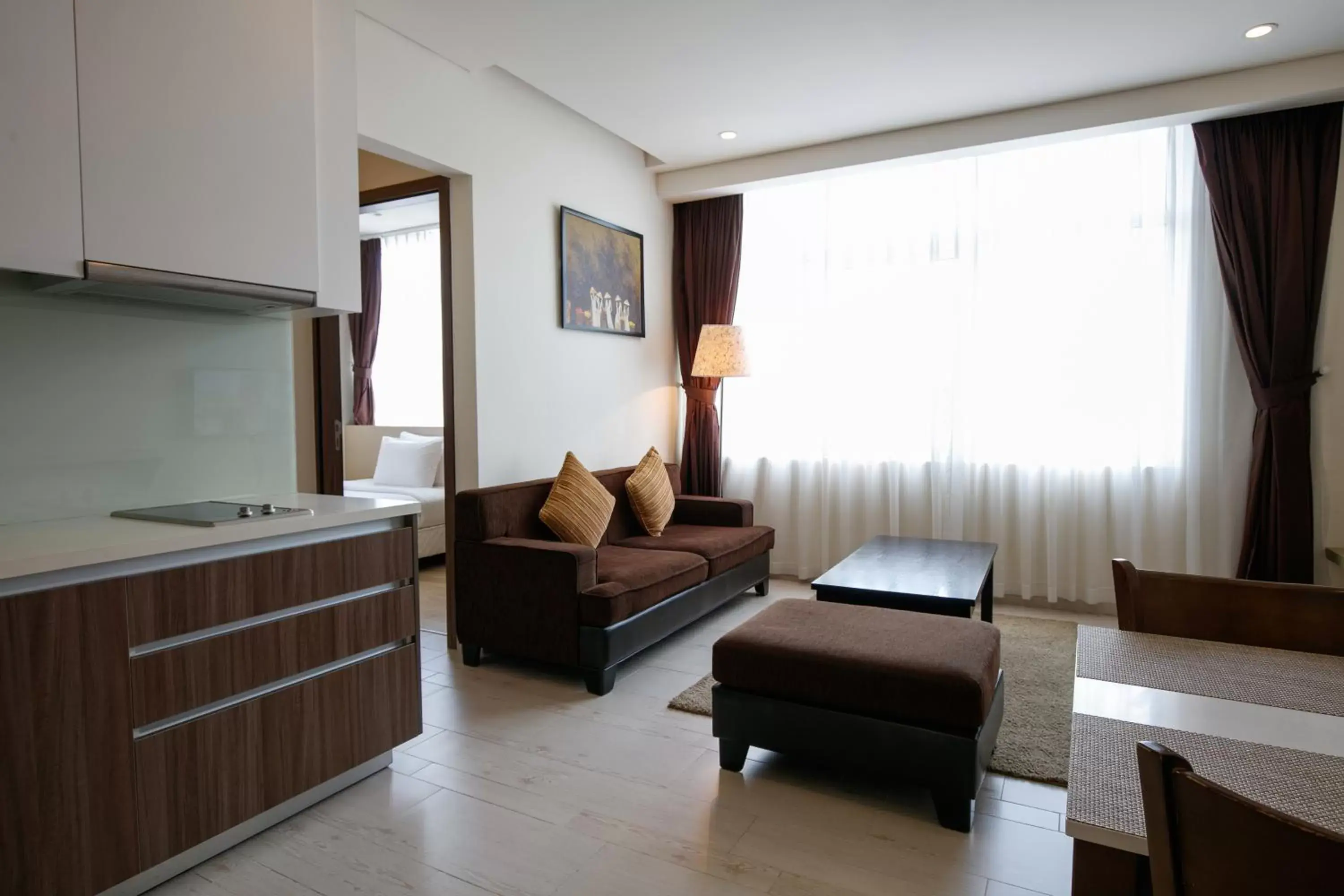 Bedroom, Seating Area in ÊMM Hotel Saigon