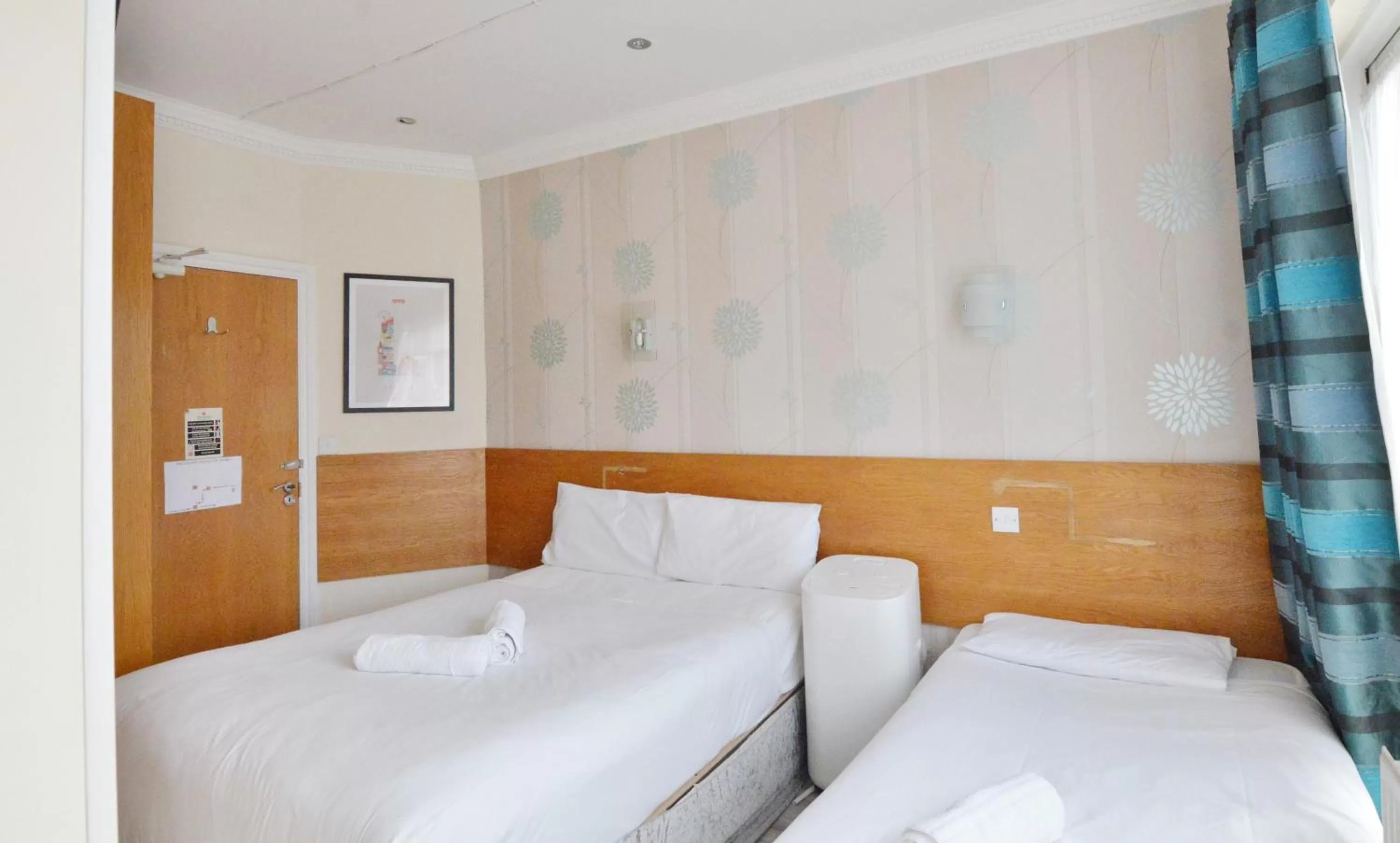 Bed in Anchor Guest House