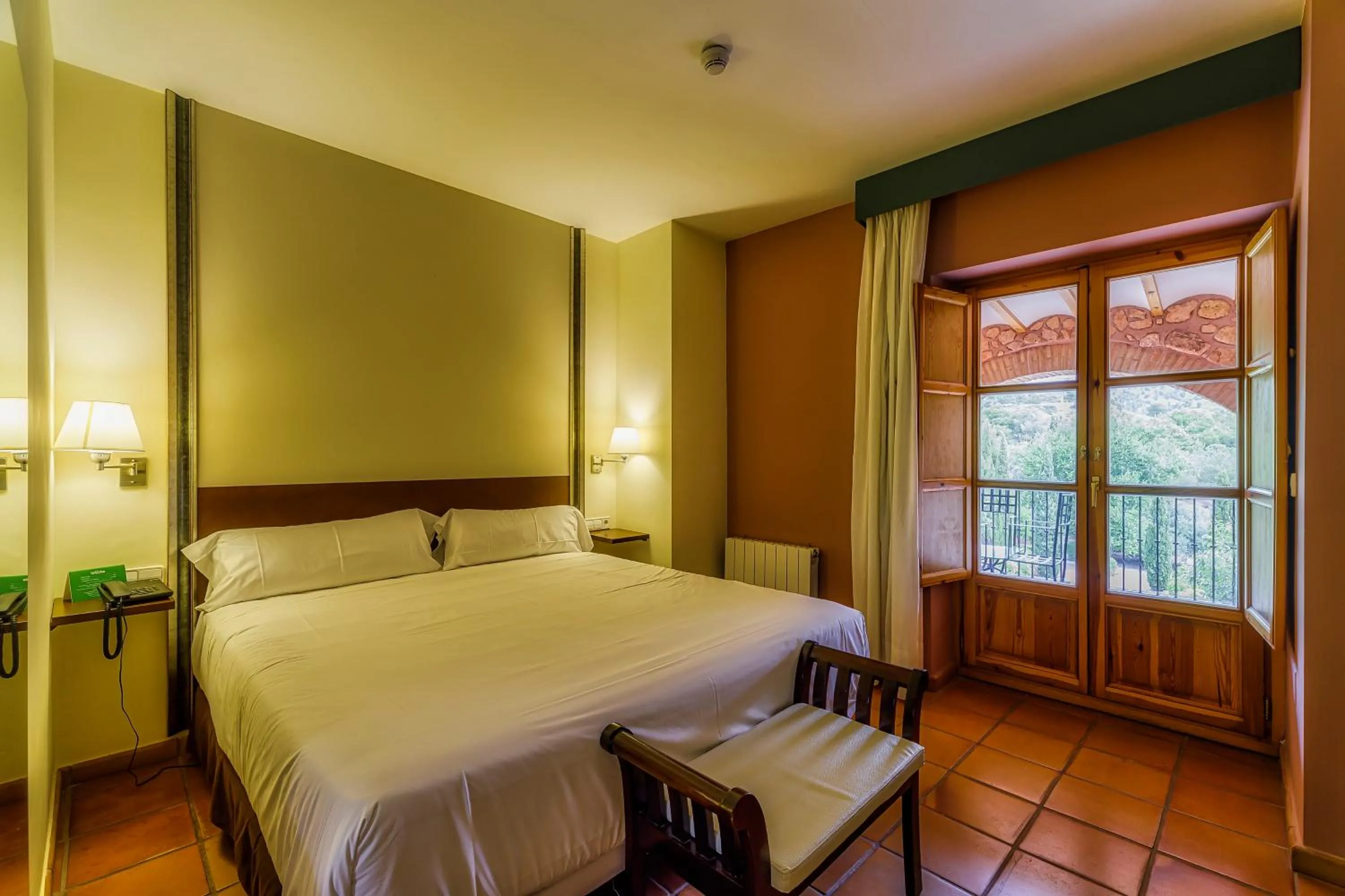 Photo of the whole room, Bed in Jardines de La Santa