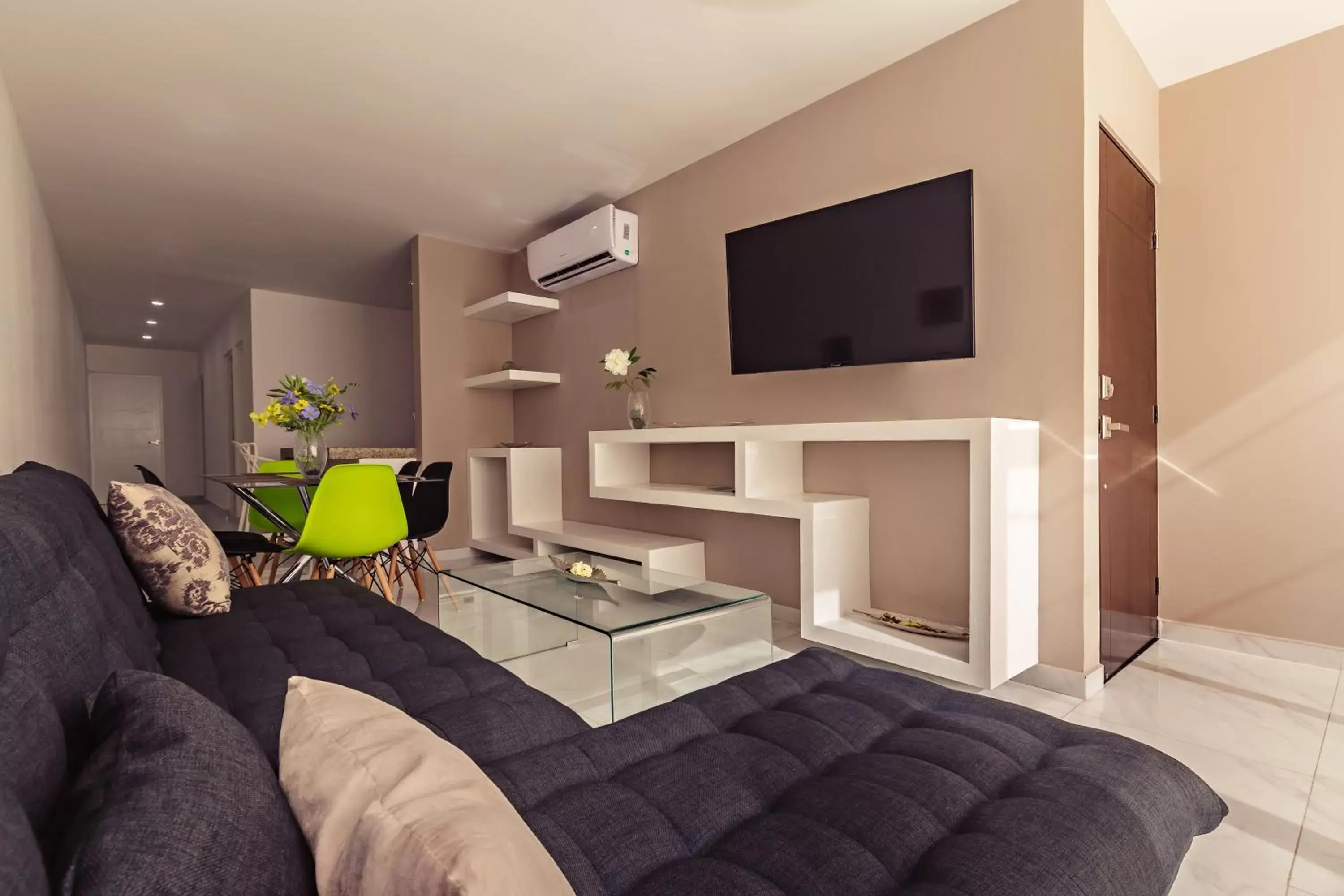 TV and multimedia, Seating Area in Mararena Condos by Nah Hotels