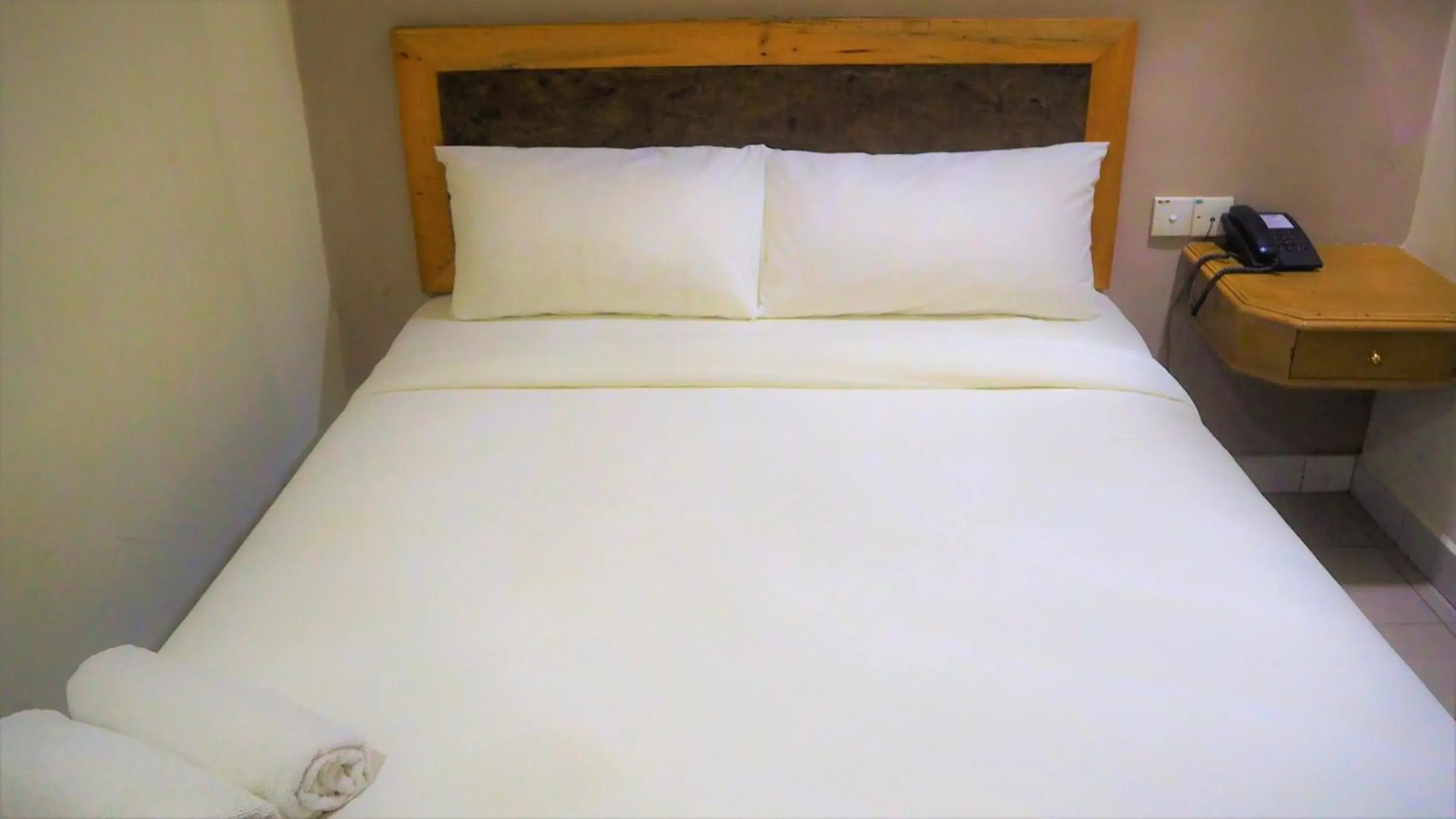 Bed in Leo Palace Hotel