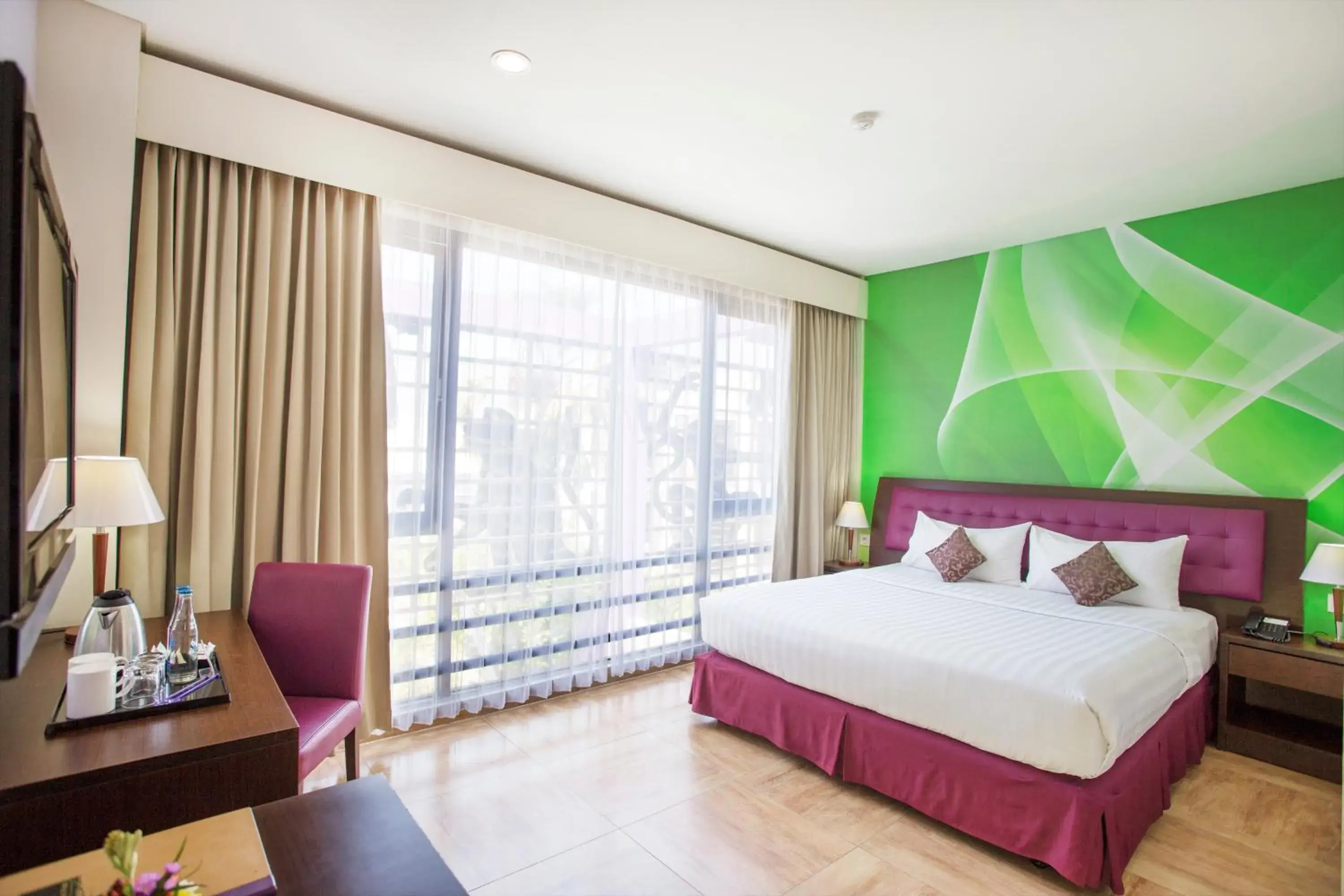 Bed in Kuta Central Park Hotel