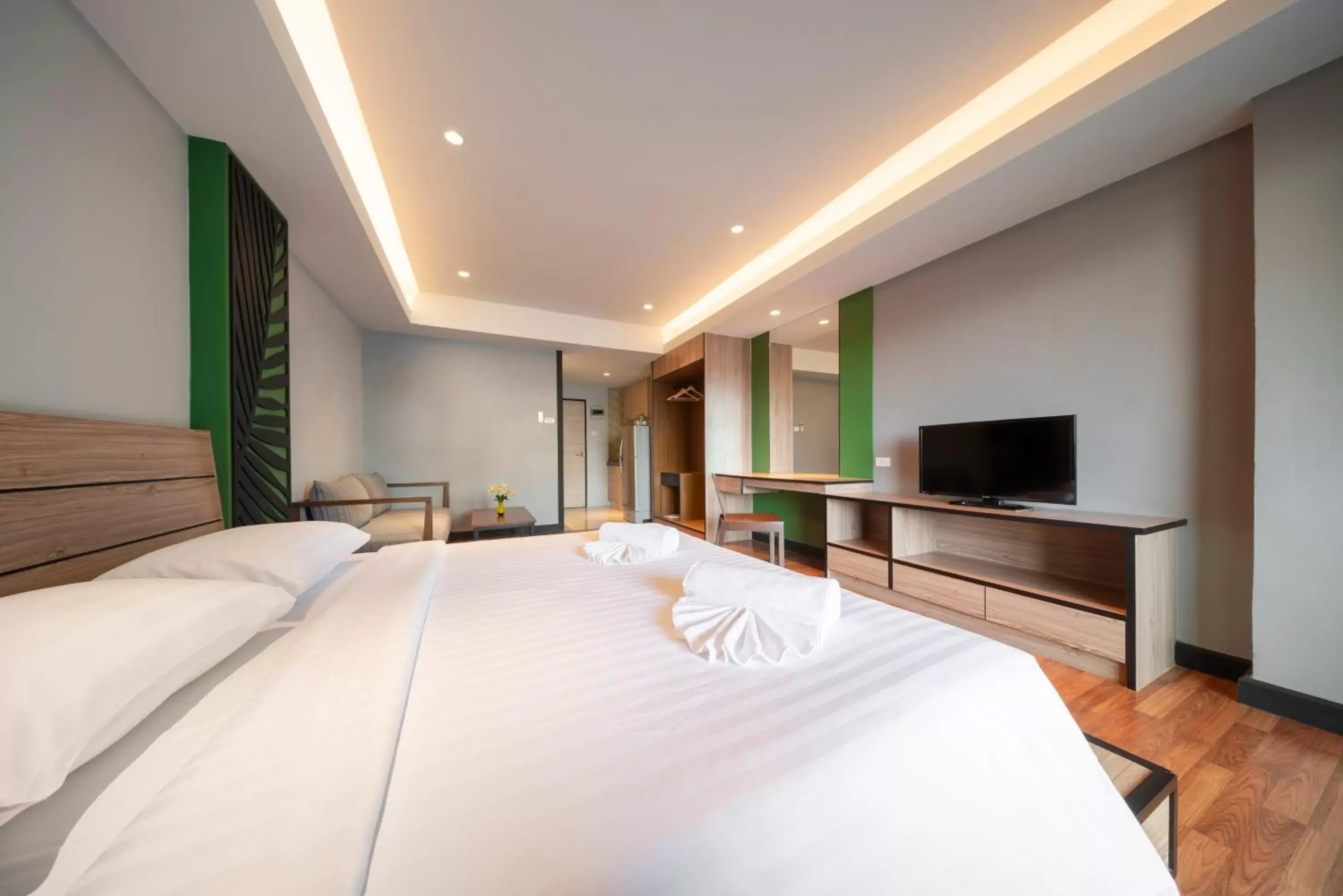 Bed in At 115 Hotel By Rompo
