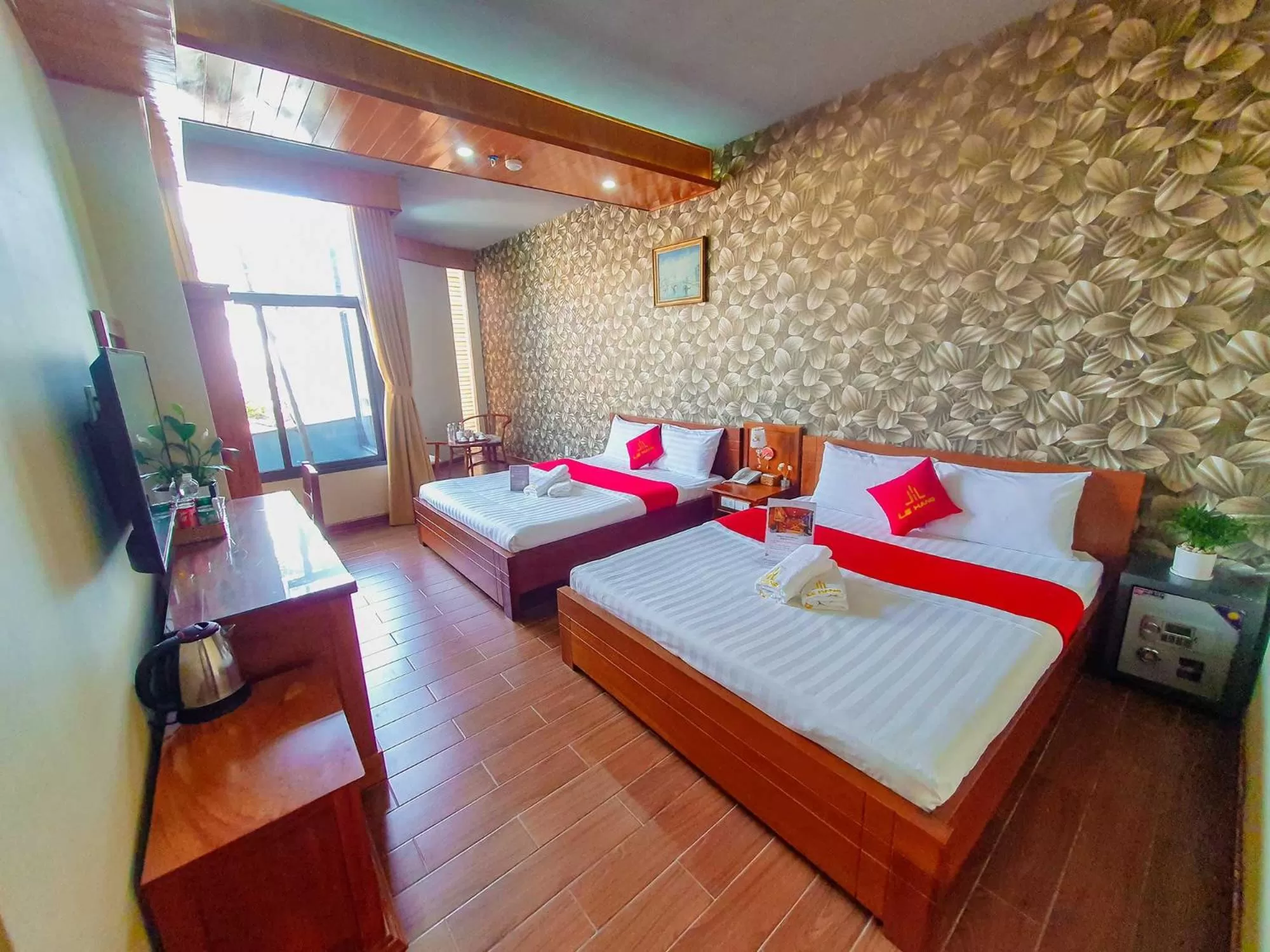 Photo of the whole room, Bed in LEHA Saigon Hotel Airport