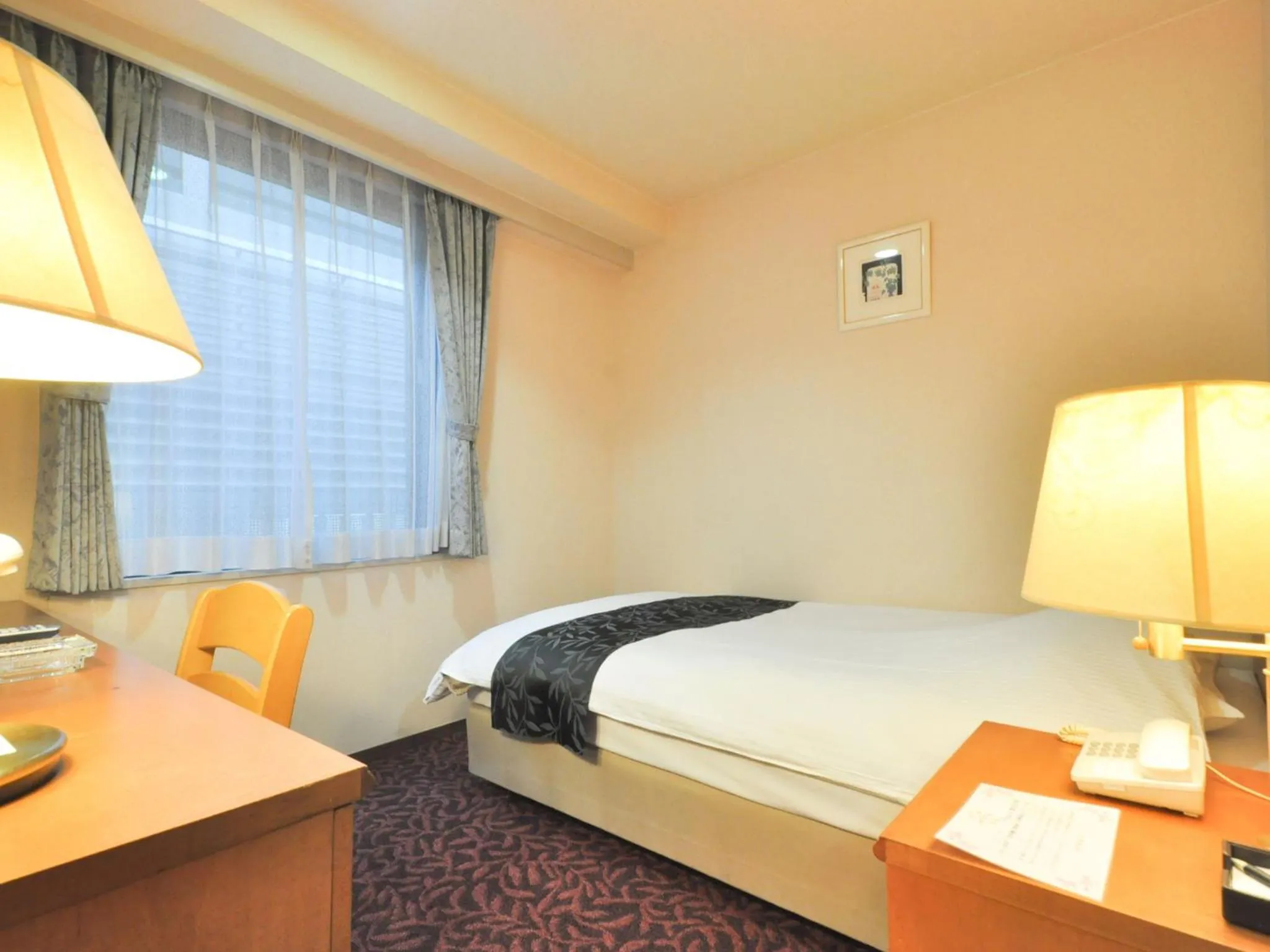Photo of the whole room, Bed in Kobe City Gardens Hotel (Formally Hotel Kobe Shishuen)