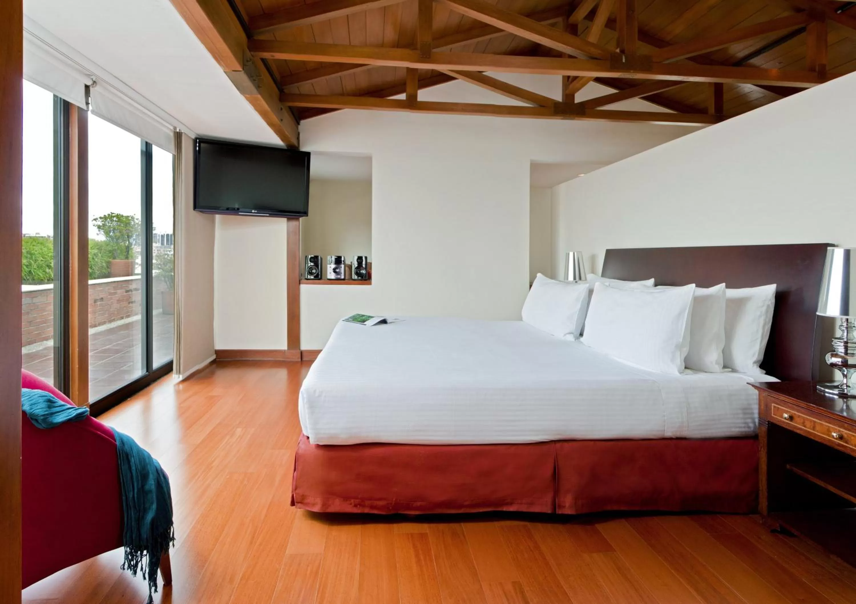 Bed in Santafe Boutique Hotel