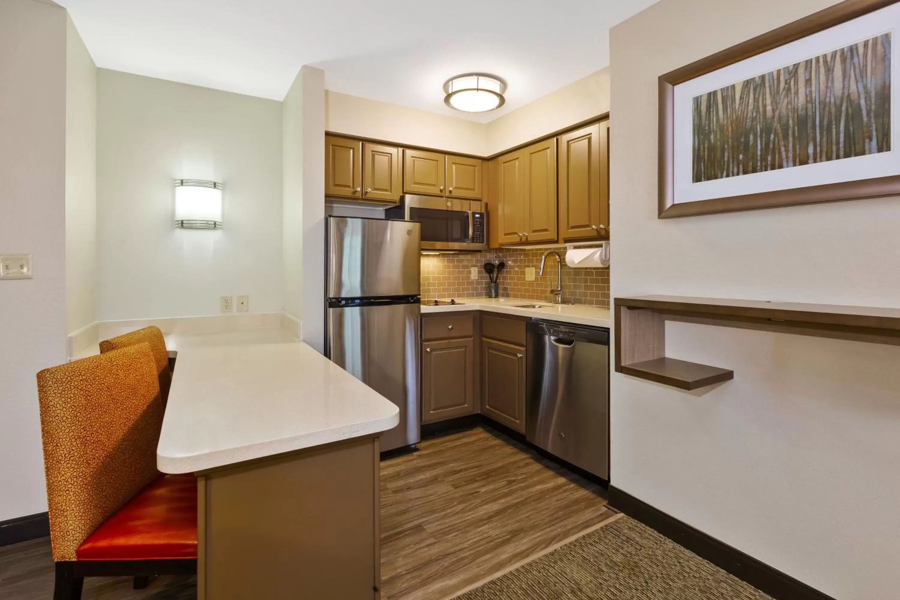 Kitchen or kitchenette, Kitchen/Kitchenette in Staybridge Suites Kalamazoo, an IHG Hotel