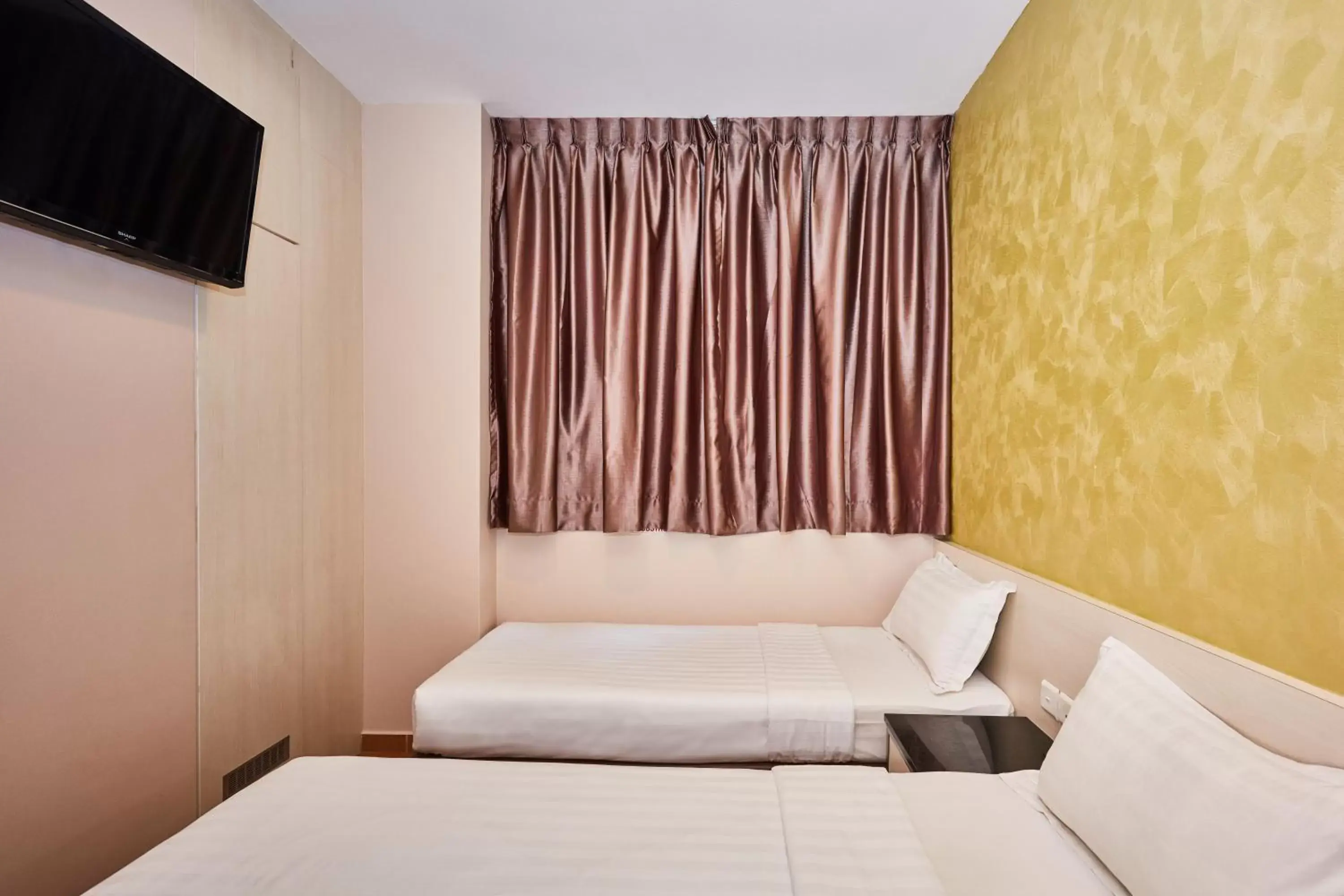Bed in Ibis Budget Singapore West Coast