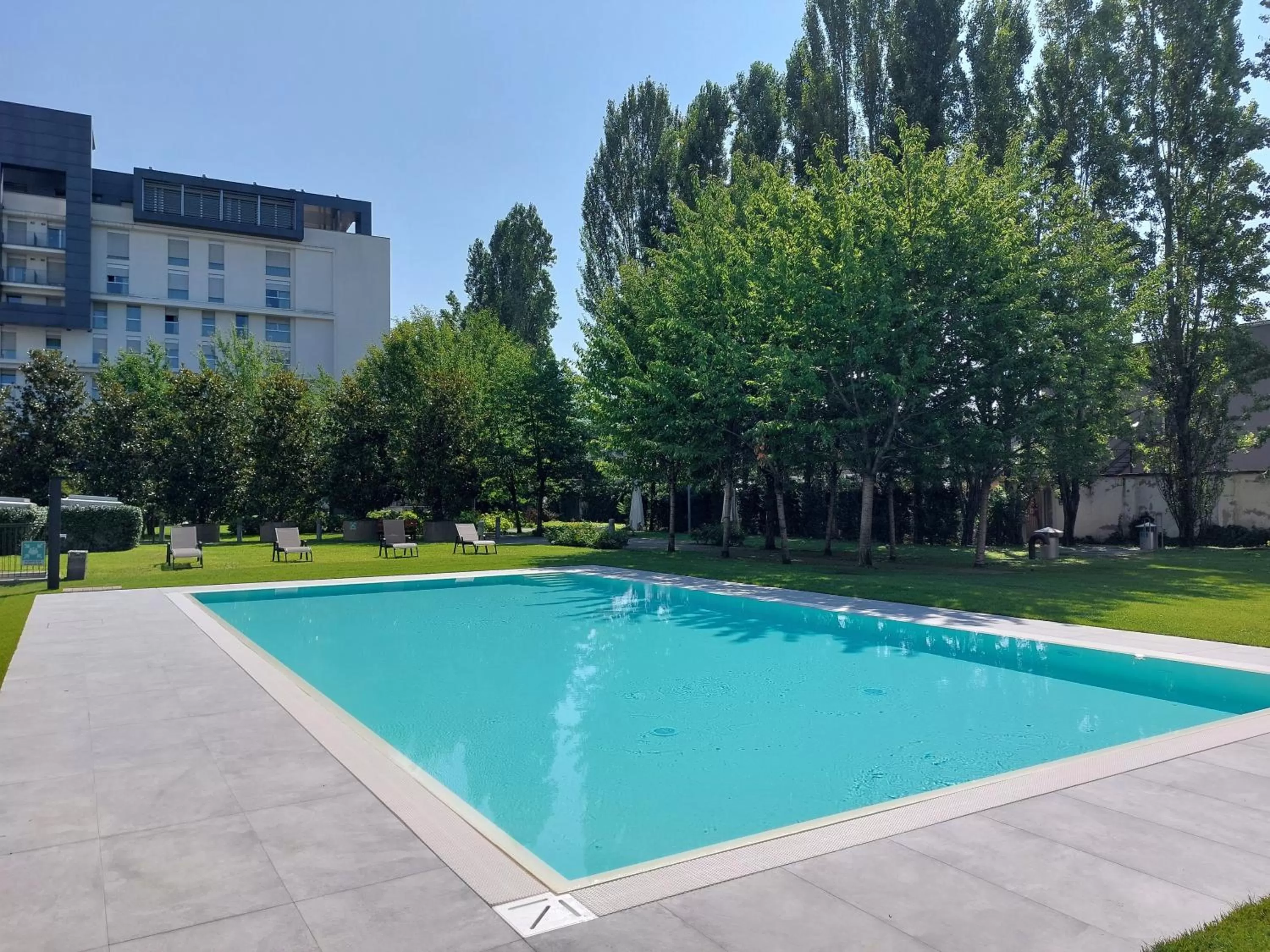 Swimming pool in Ramada Plaza by Wyndham Milano