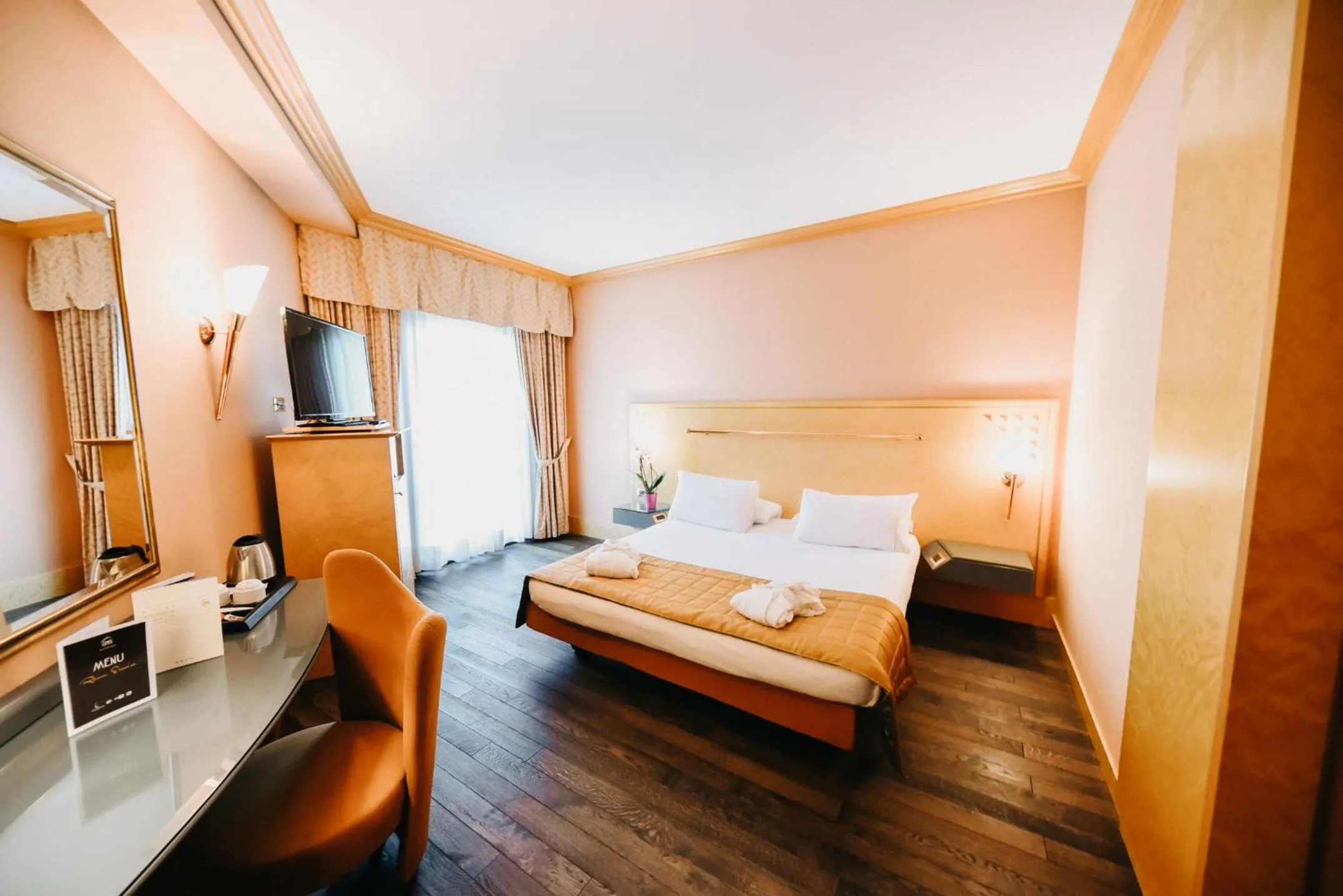 Bed in SHG Hotel Antonella