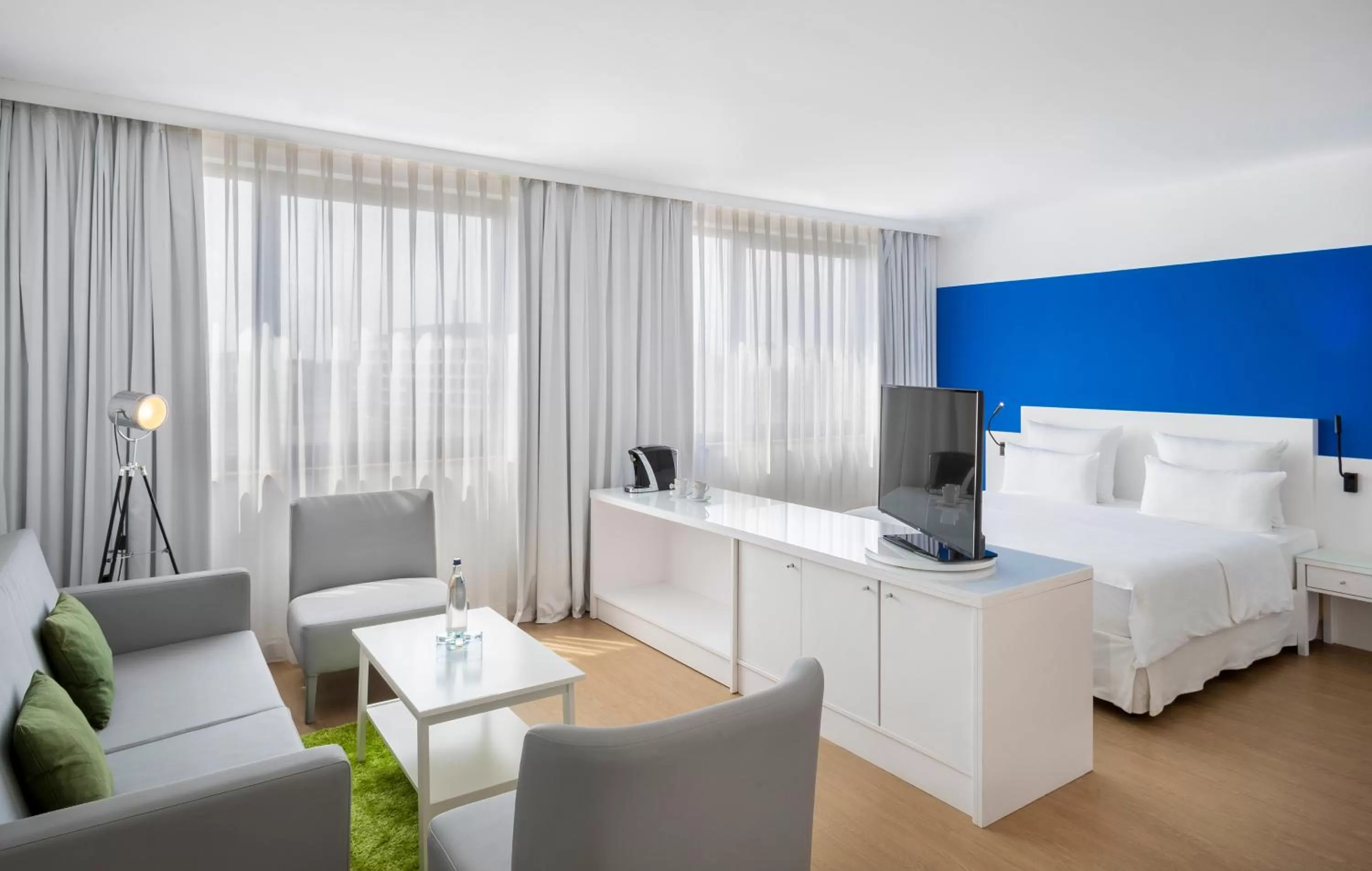 Living room, Bed in Hotel Frankfurt Messe Affiliated by Meliá