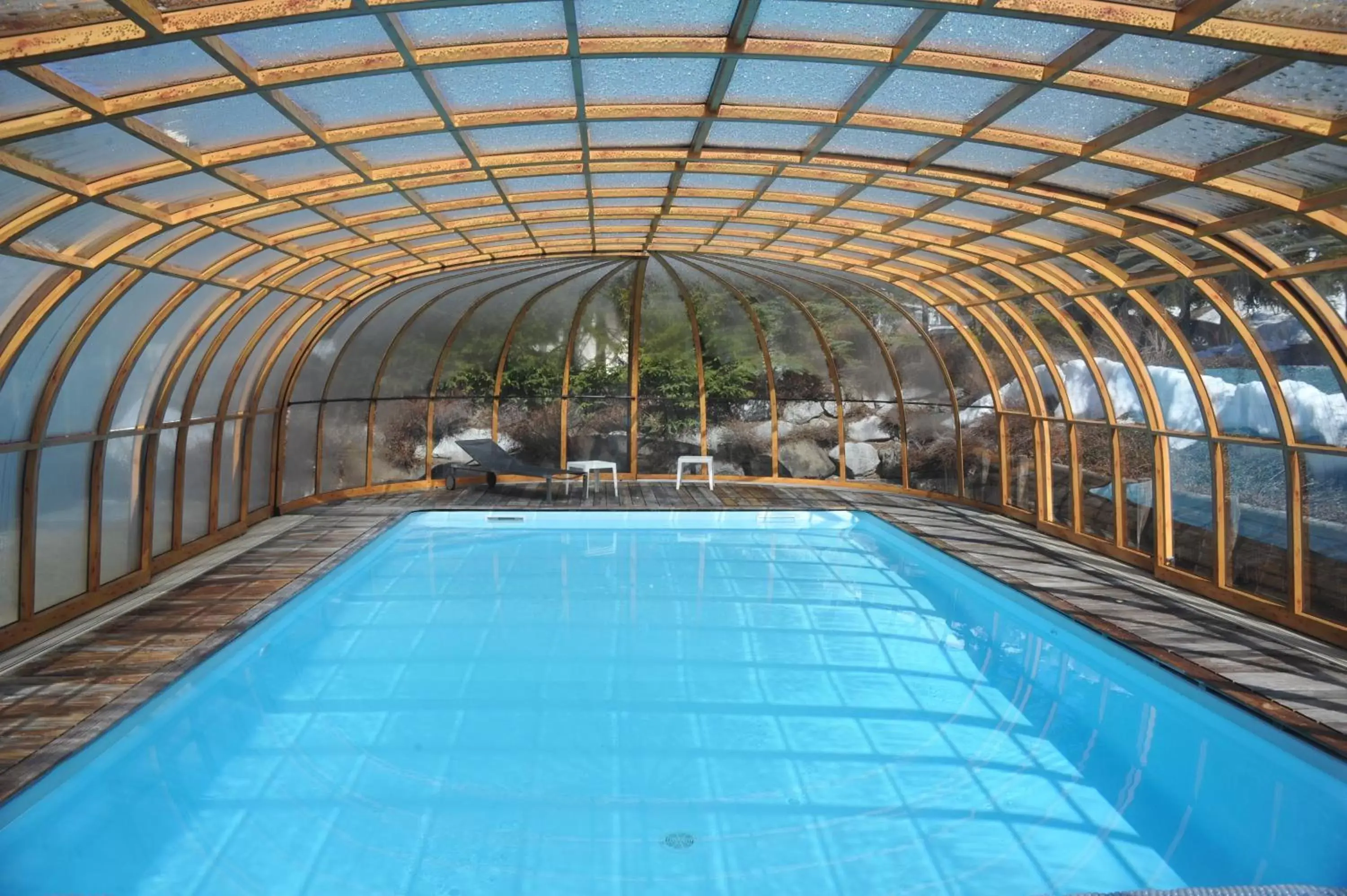 Swimming Pool in Hôtel Chalet Alpage