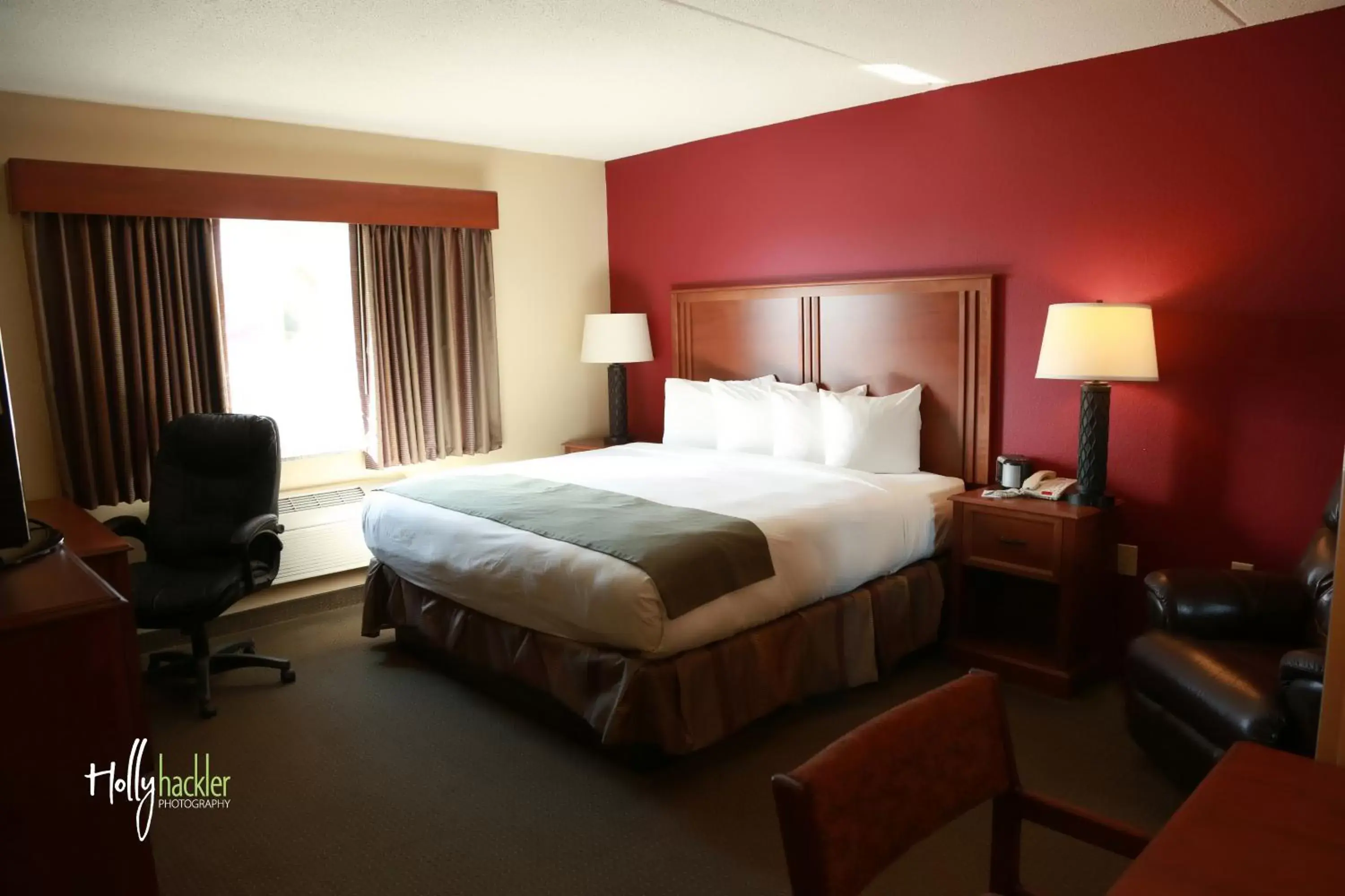 Bed in AmericInn by Wyndham McAlester