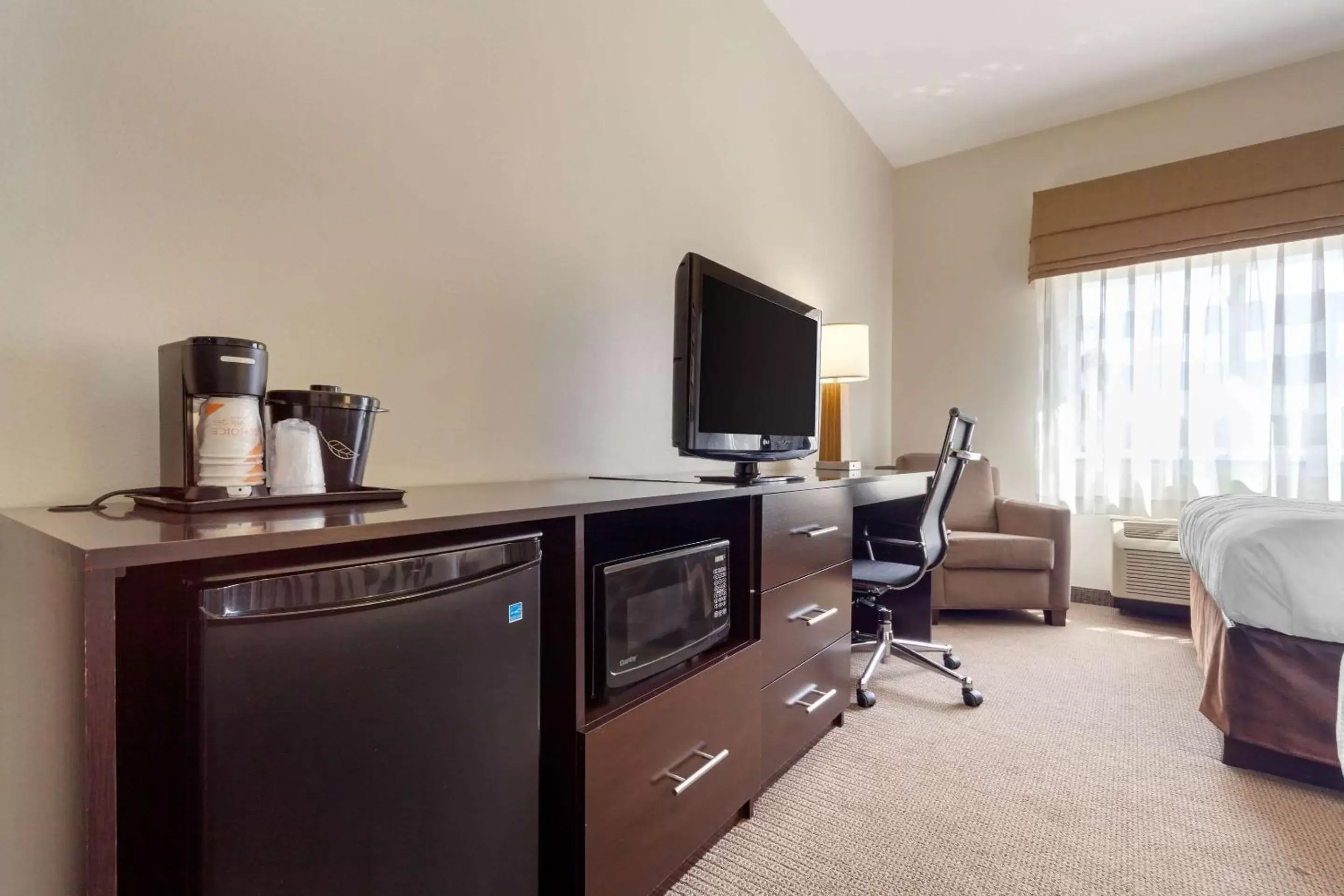 Photo of the whole room, TV/Entertainment Center in Sleep Inn & Suites Bismarck I-94
