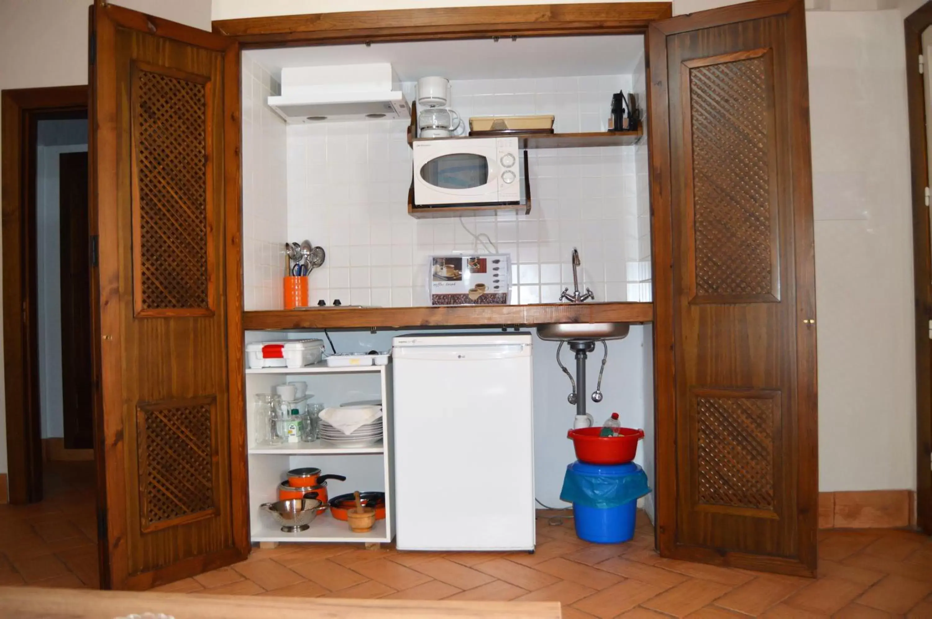 Kitchen/Kitchenette in Apartamentos Turísticos - Hostal Los Alisos