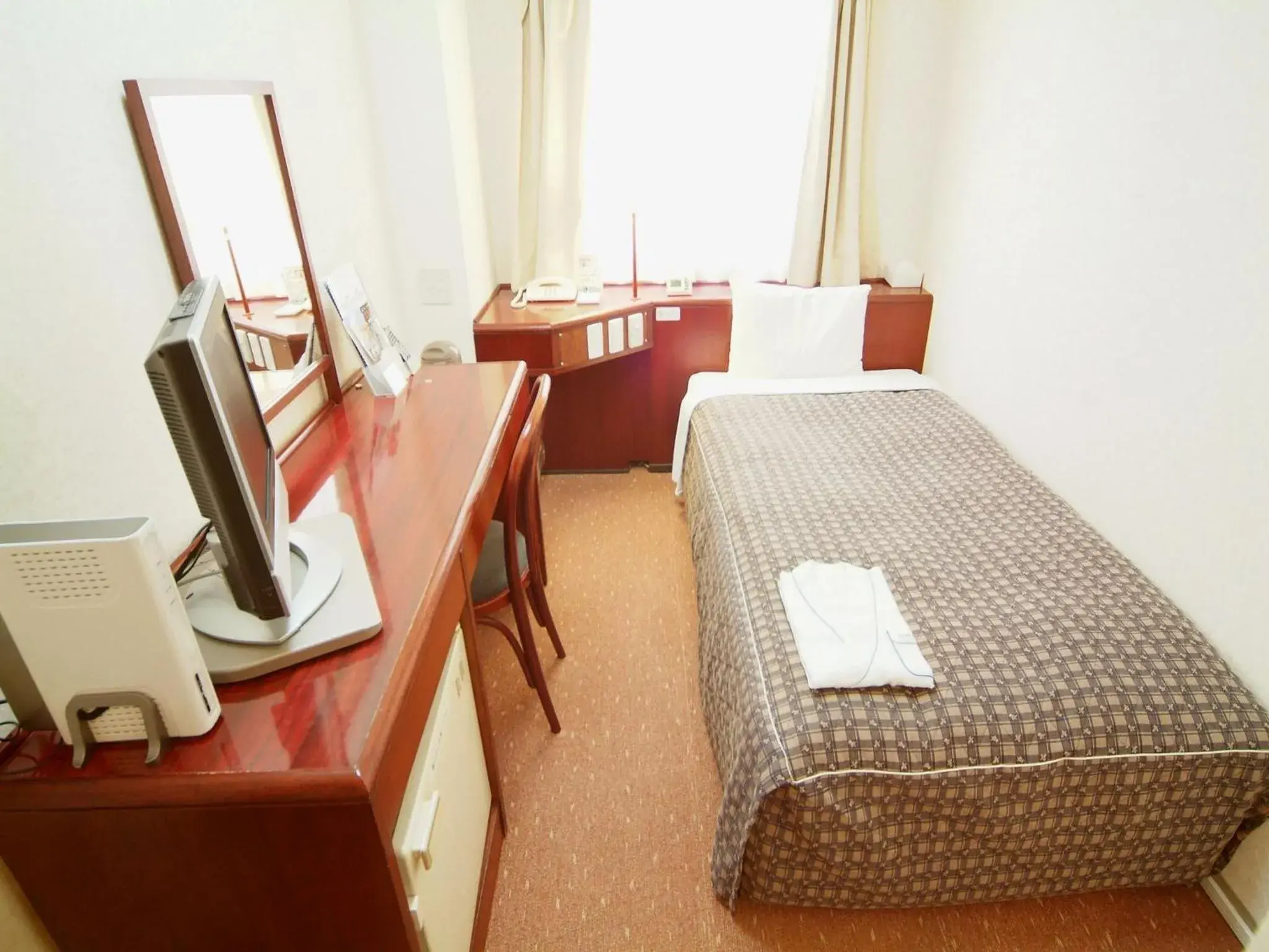 Photo of the whole room, Bed in Hotel Crown Hills Himeji