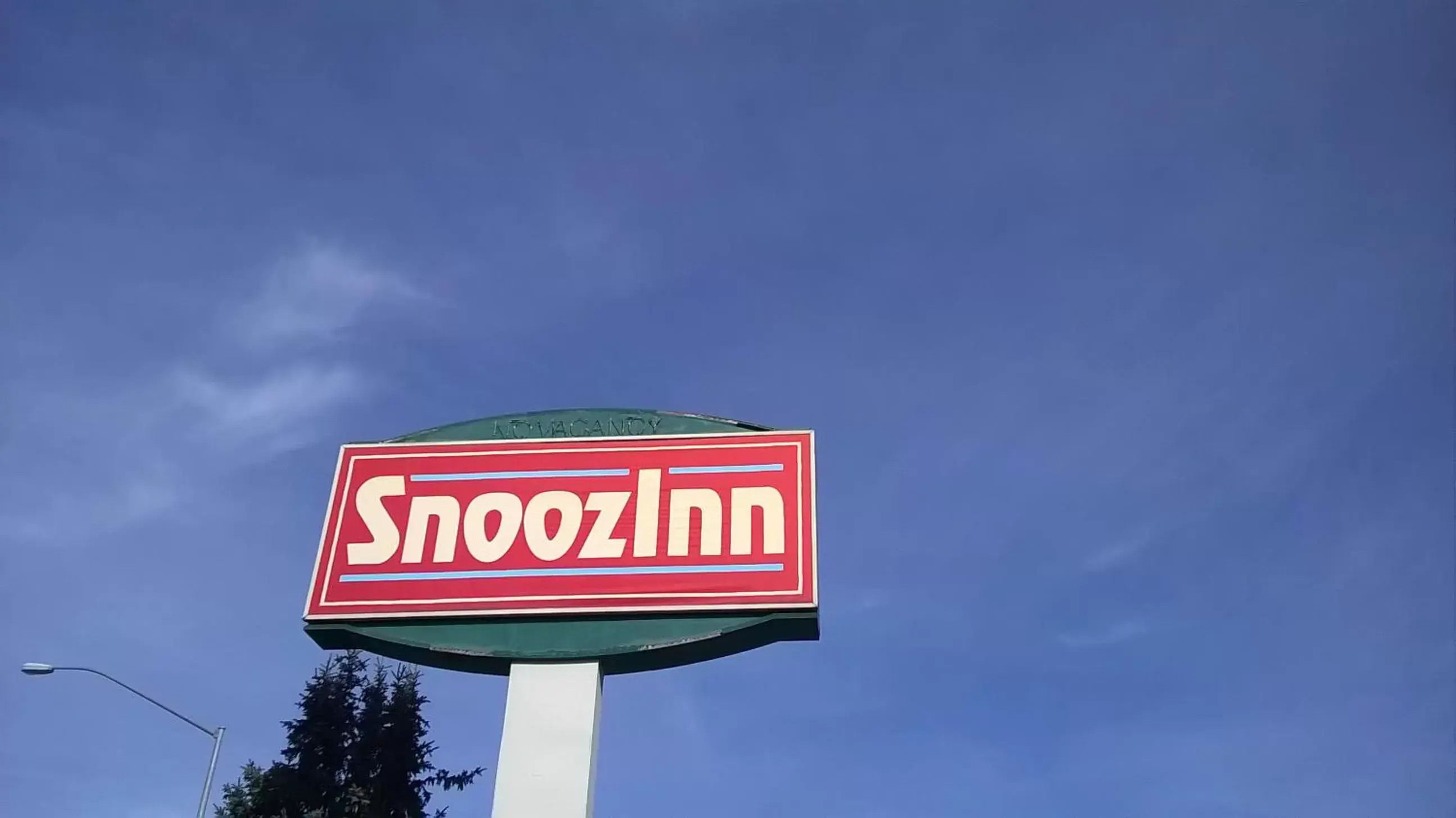 Property logo or sign in Snooz Inn