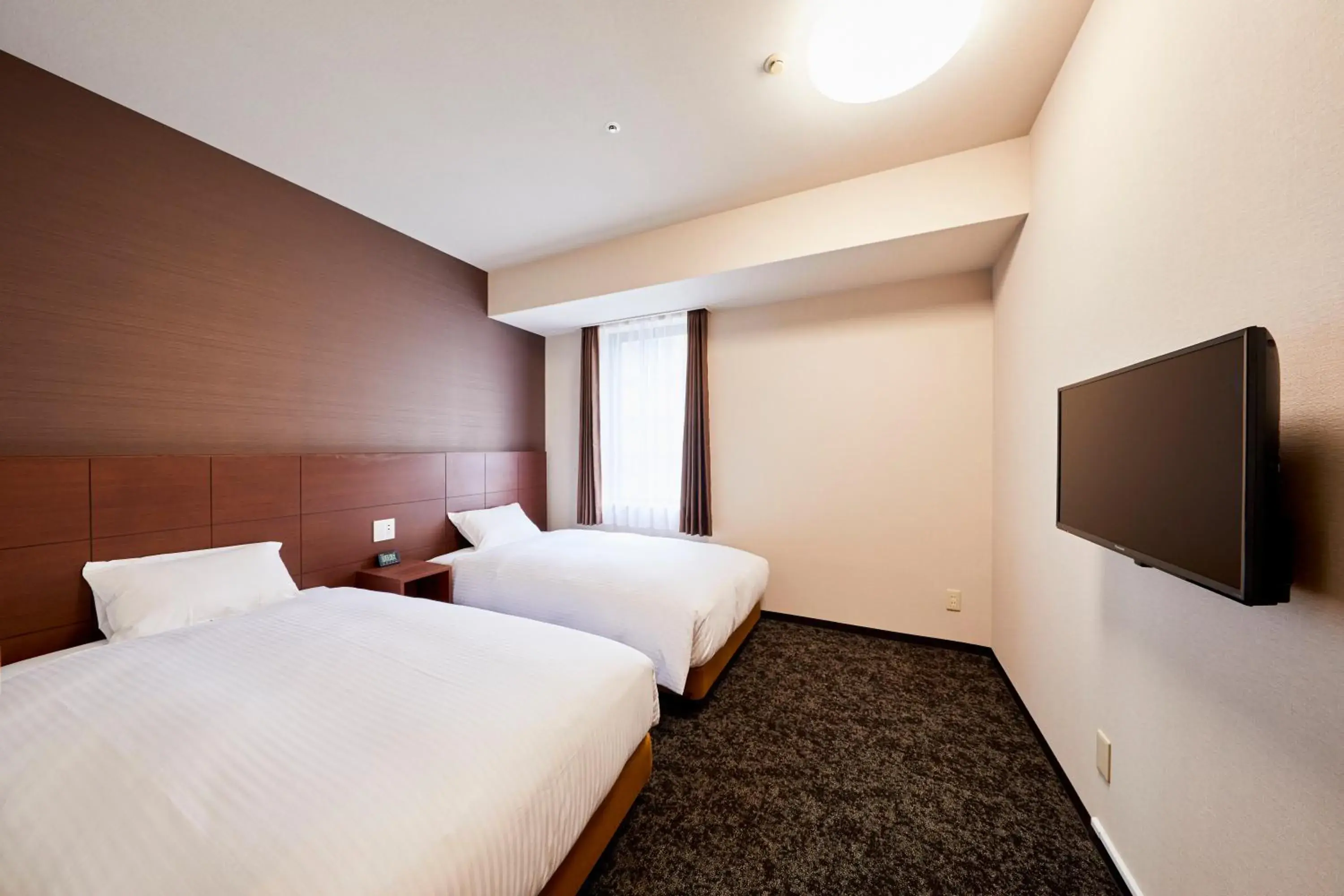 Bed in Hotel Wing International Kobe Shinnagata Ekimae