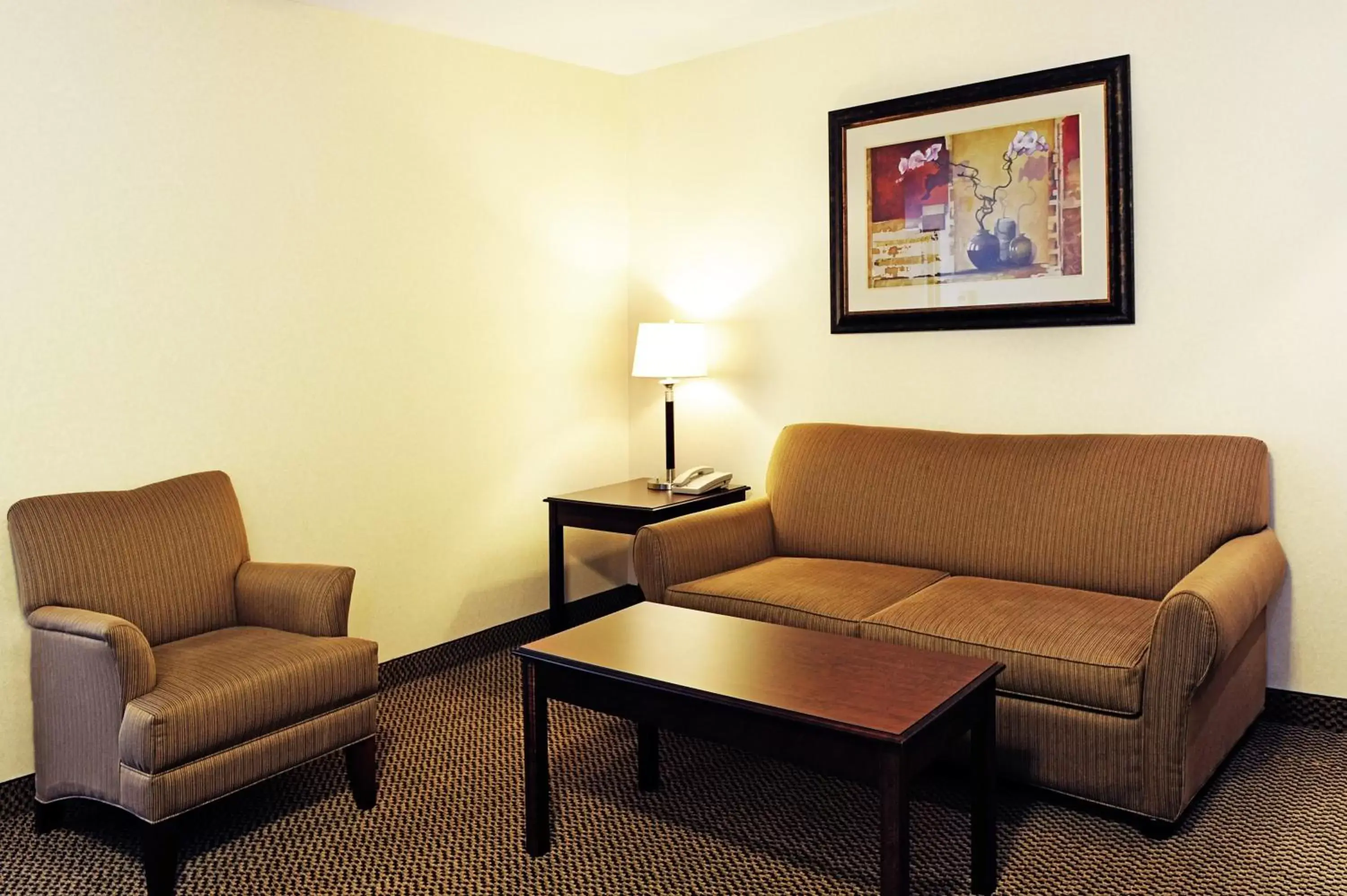 Bedroom, Seating Area in Holiday Inn Express Hotel & Suites - Slave Lake, an IHG Hotel