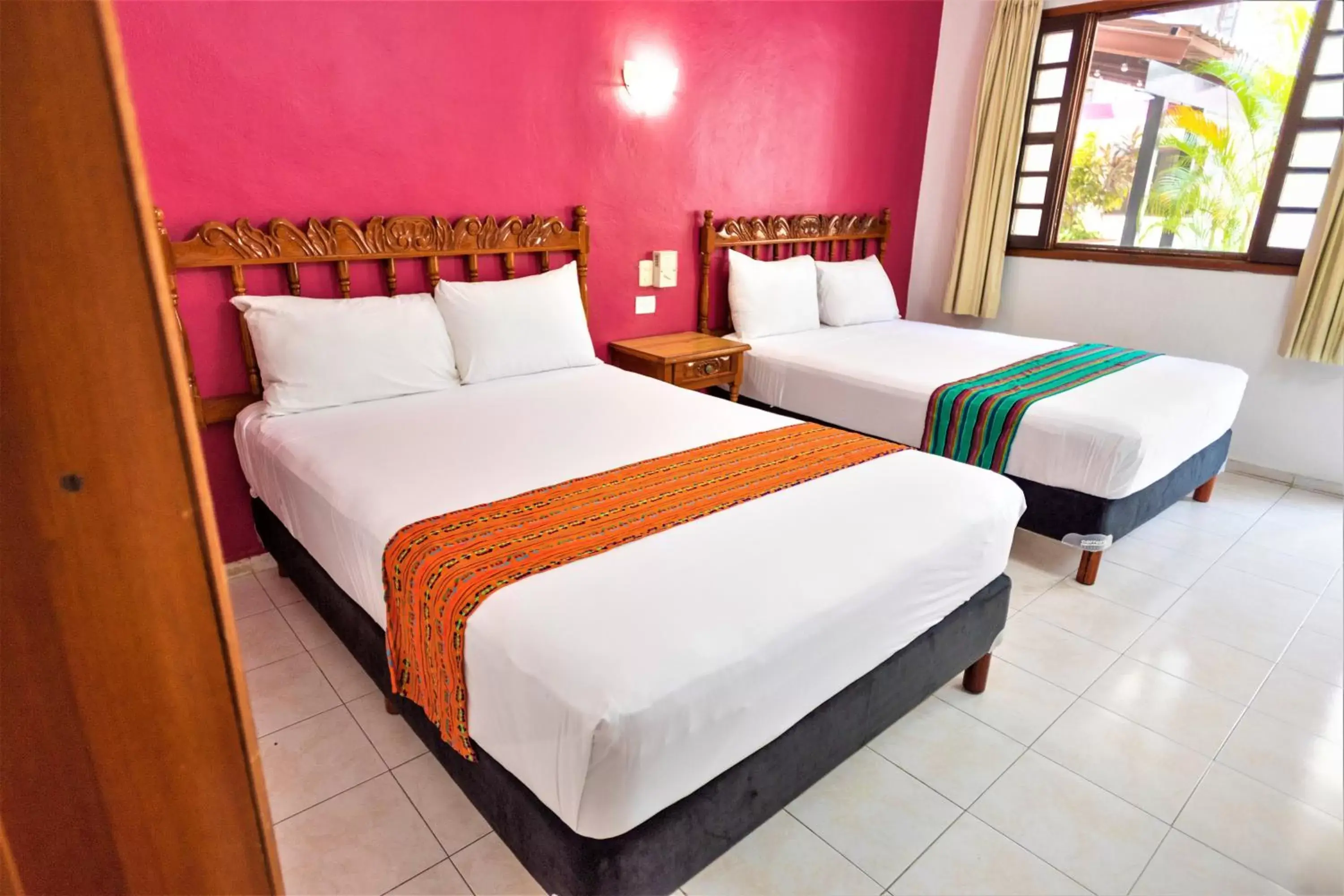 Bed in Hotel San Juan Mérida