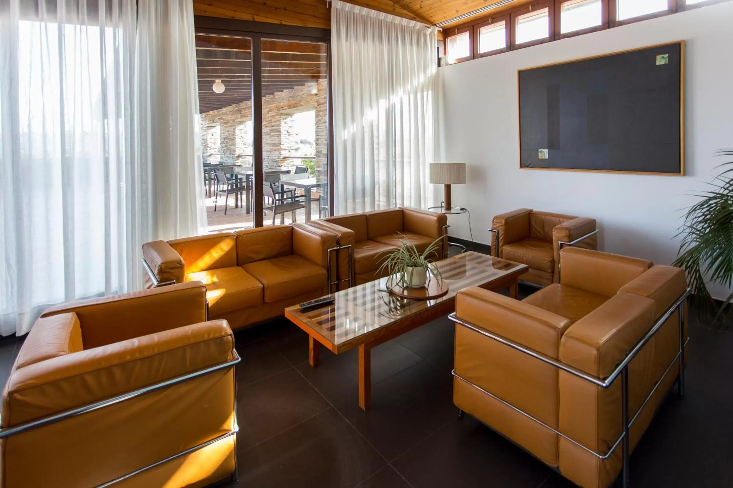 Communal lounge/ TV room, Seating Area in Hospederia Parque de Monfragüe