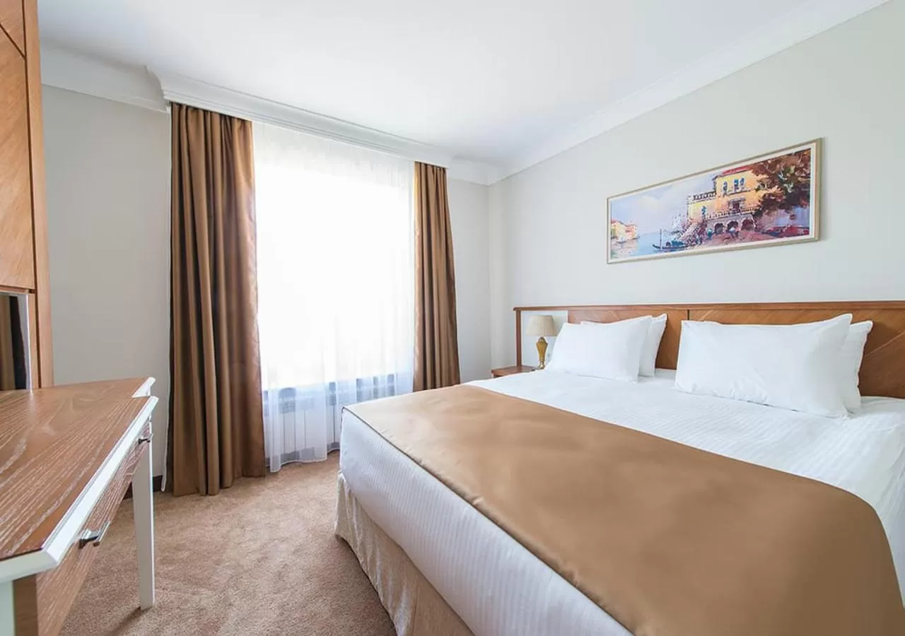 Bed in Boutique Hotel Kaspi