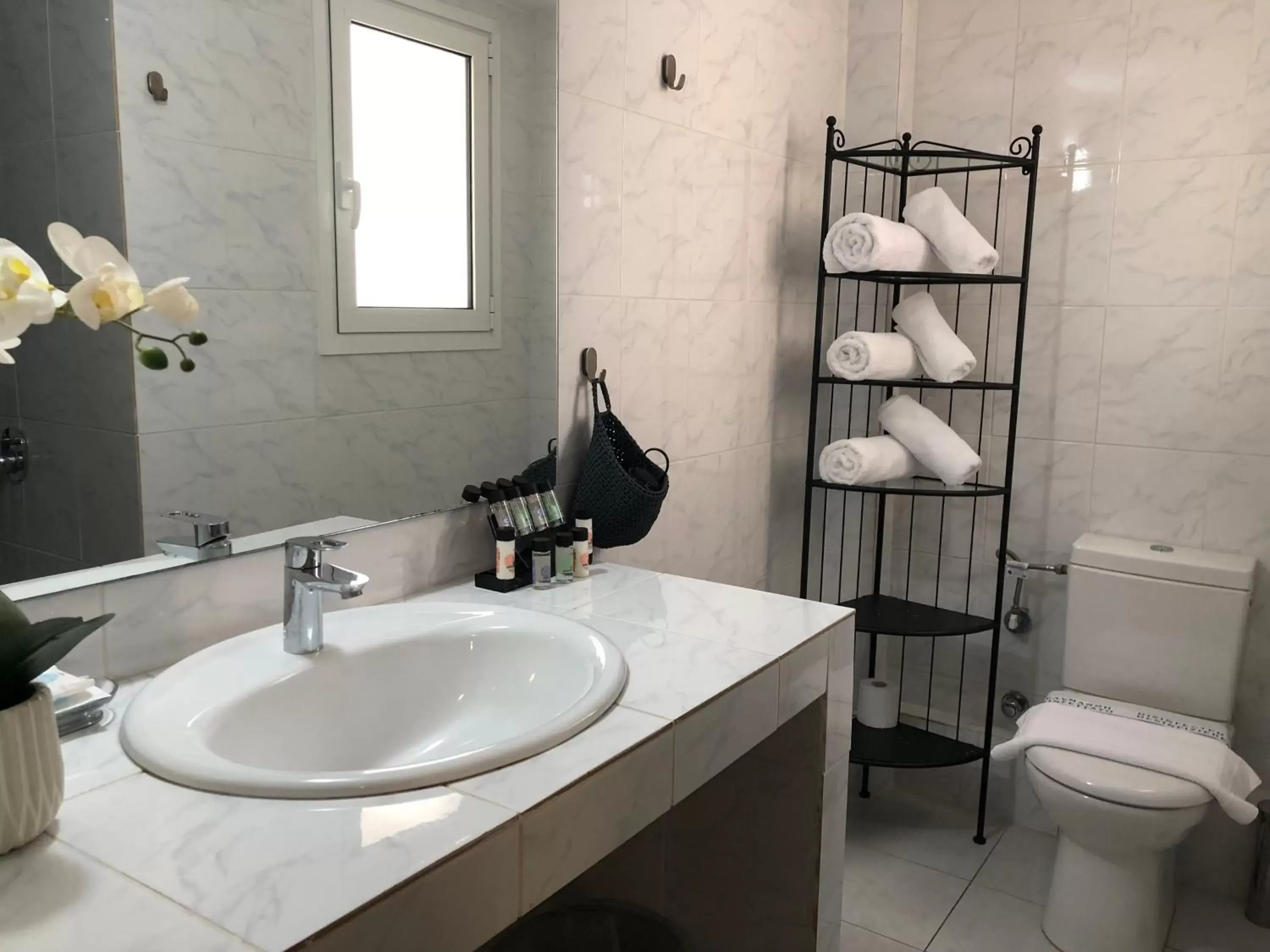 Toilet, Bathroom in Connect Suites