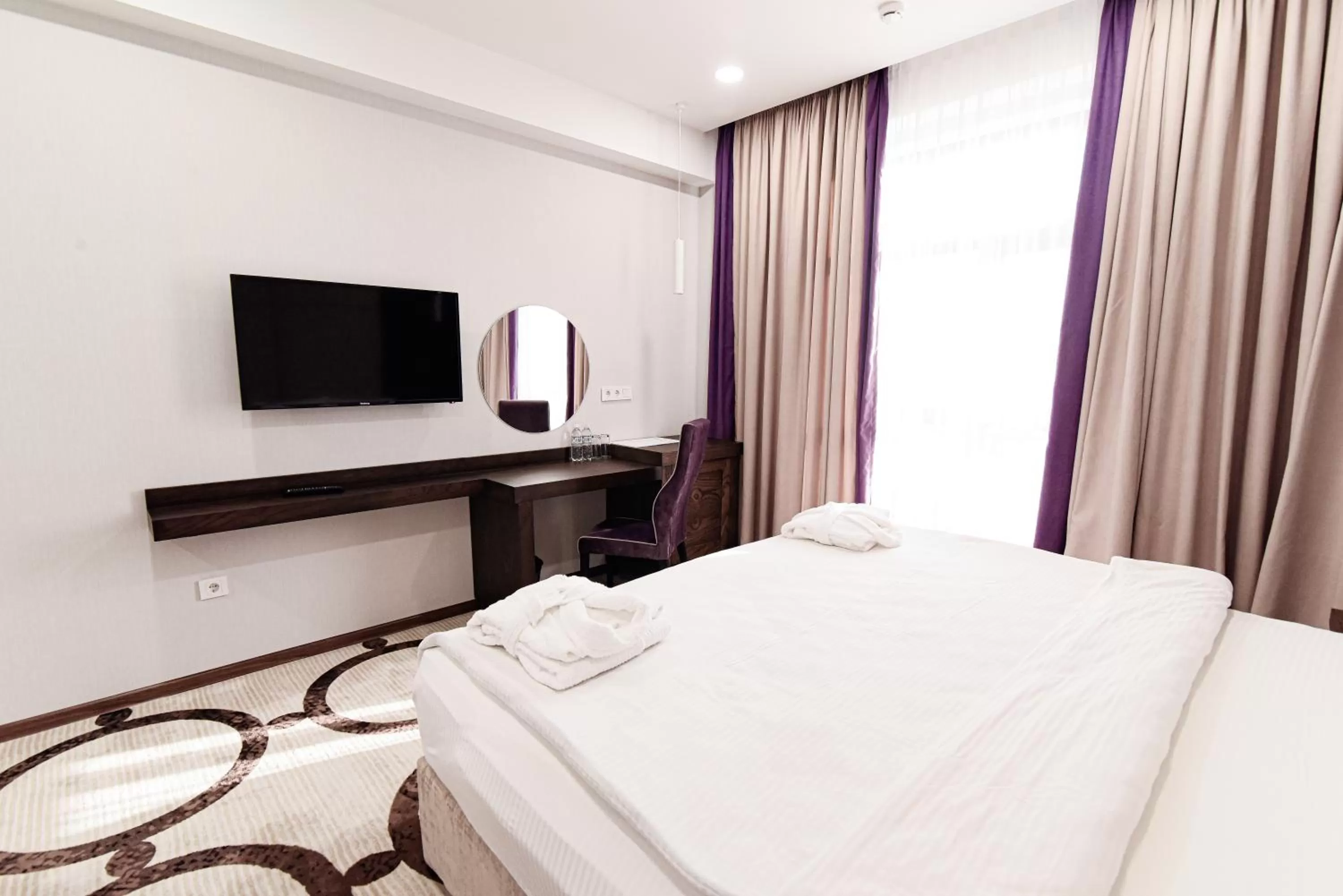 Bed in East Palace Hotel