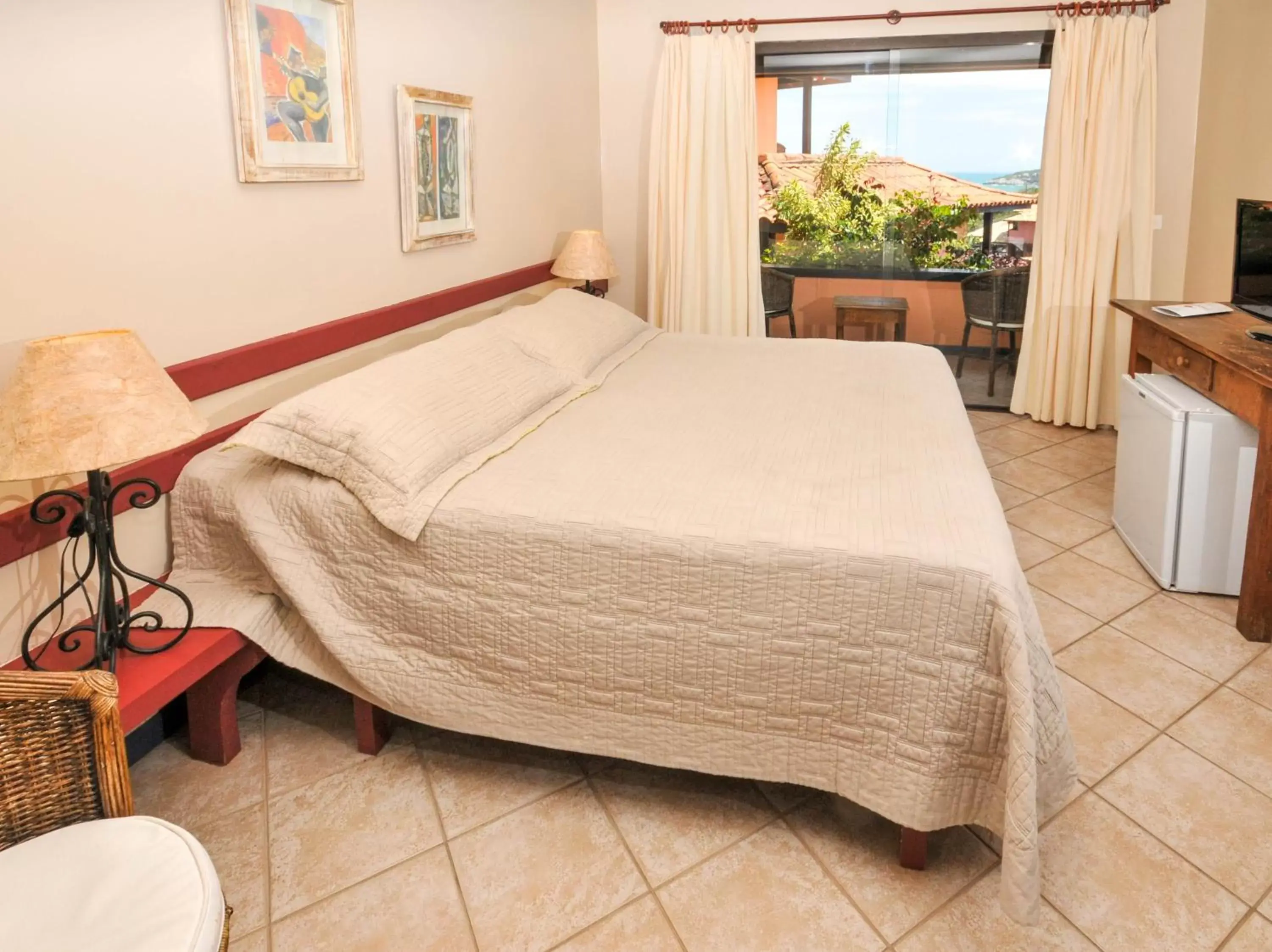 Bed in Aguabúzios Hotel