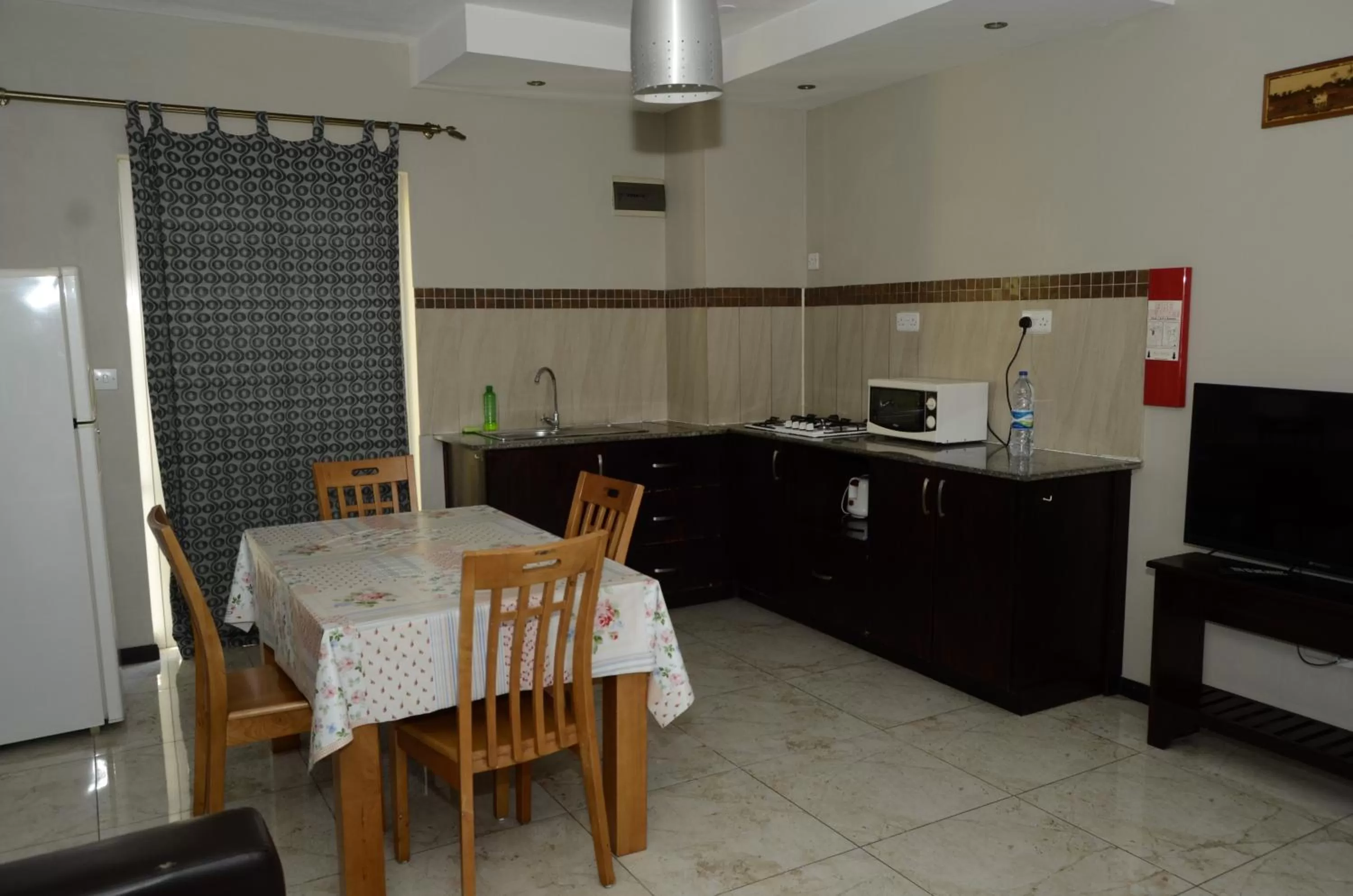 Kitchen or kitchenette in Villa Narmada